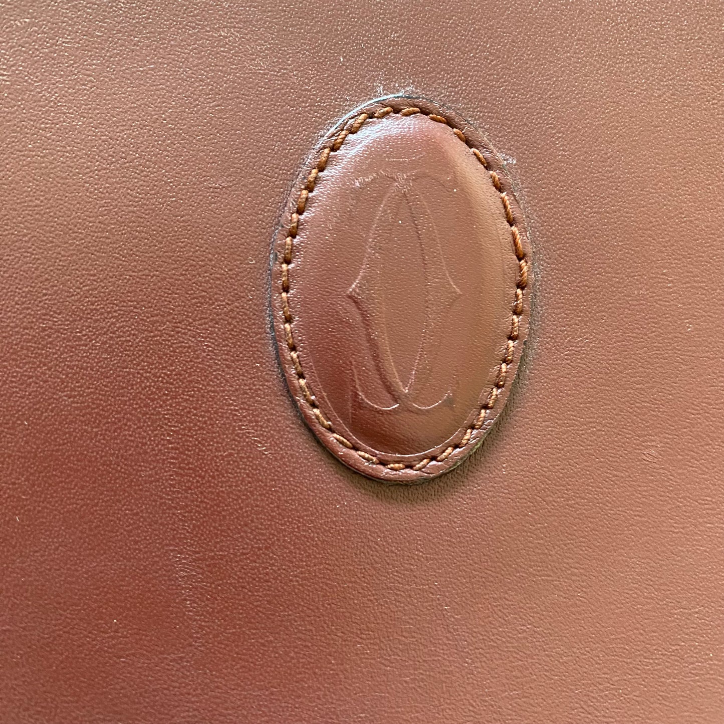 Cartier burgundy leather clutch bag Authentic with coa