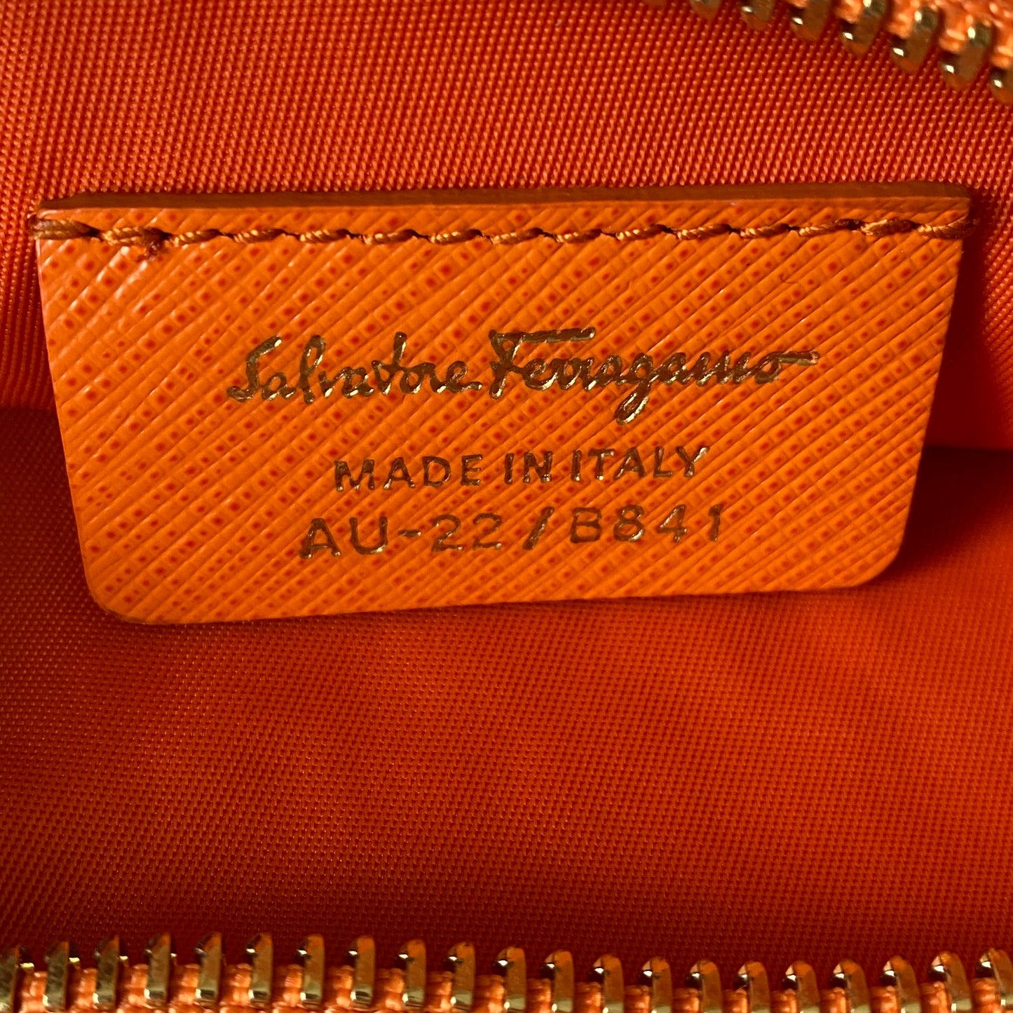 Ferragamo Orange vara bow pouch Authentic with COA