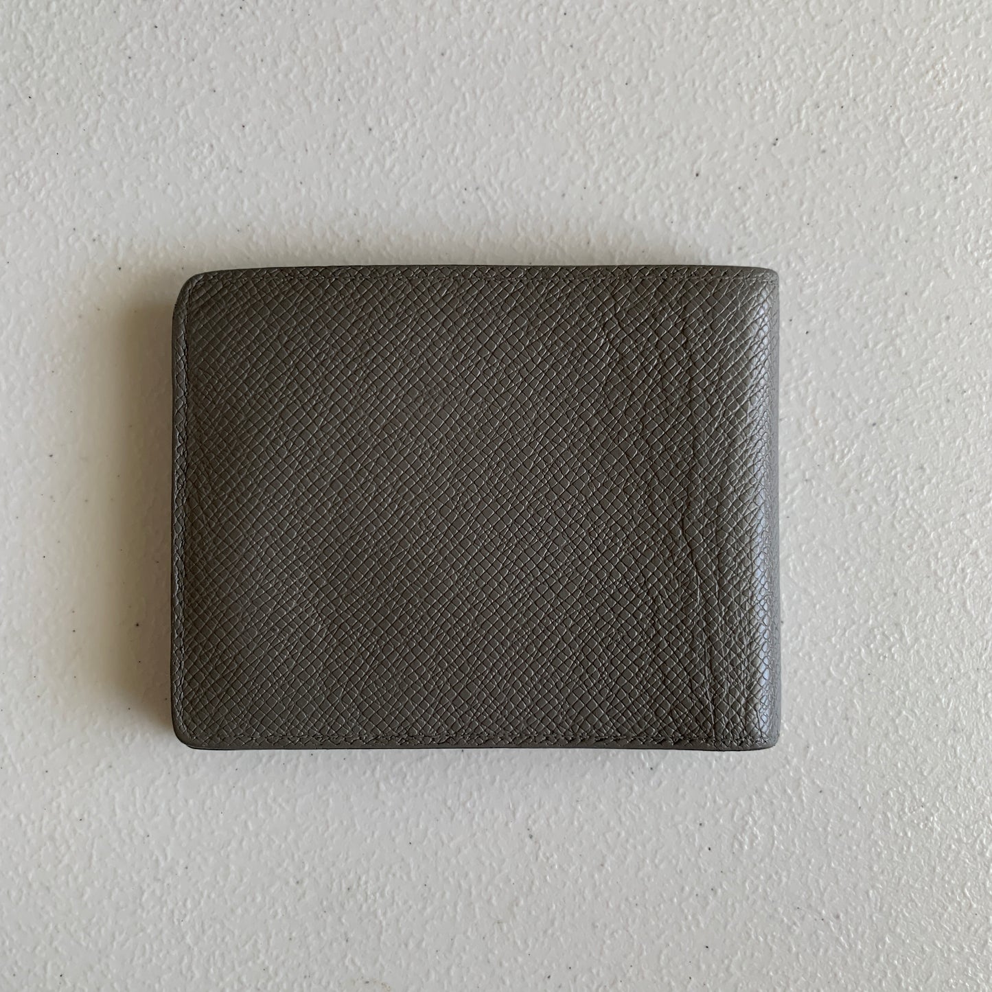 Louis Vuitton taiga men’s bifold leather wallet SP4152 authentic with COA