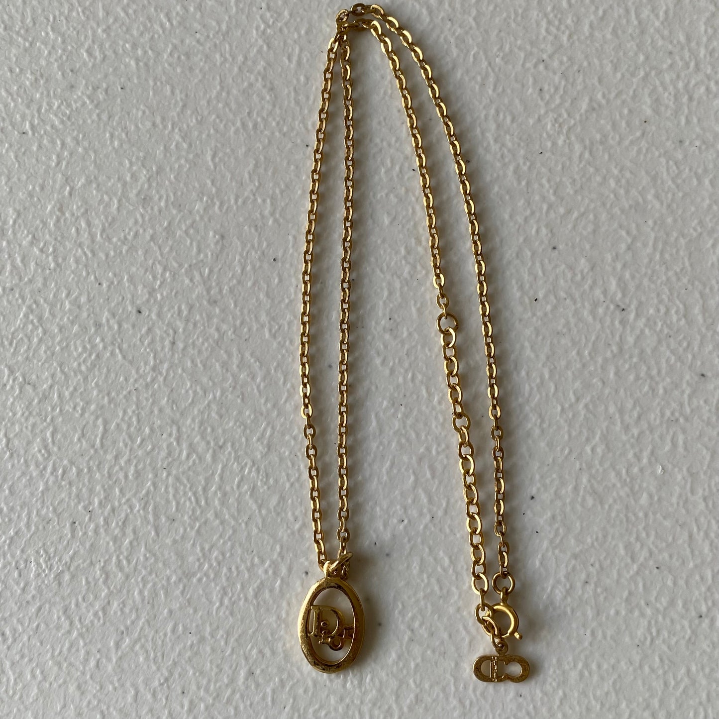 Dior CD logo pendant gold plated adjustable necklace Authentic with coa
