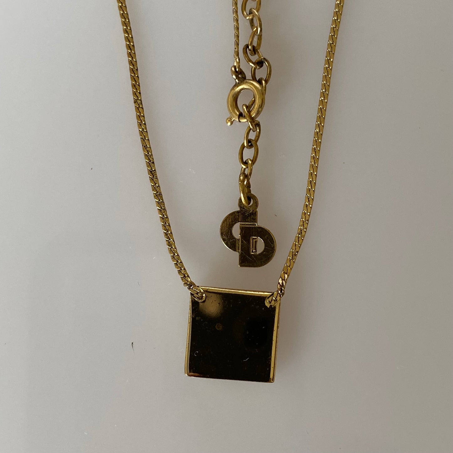 Dior logo gold plated square pendant adjustable necklace Authentic with COA