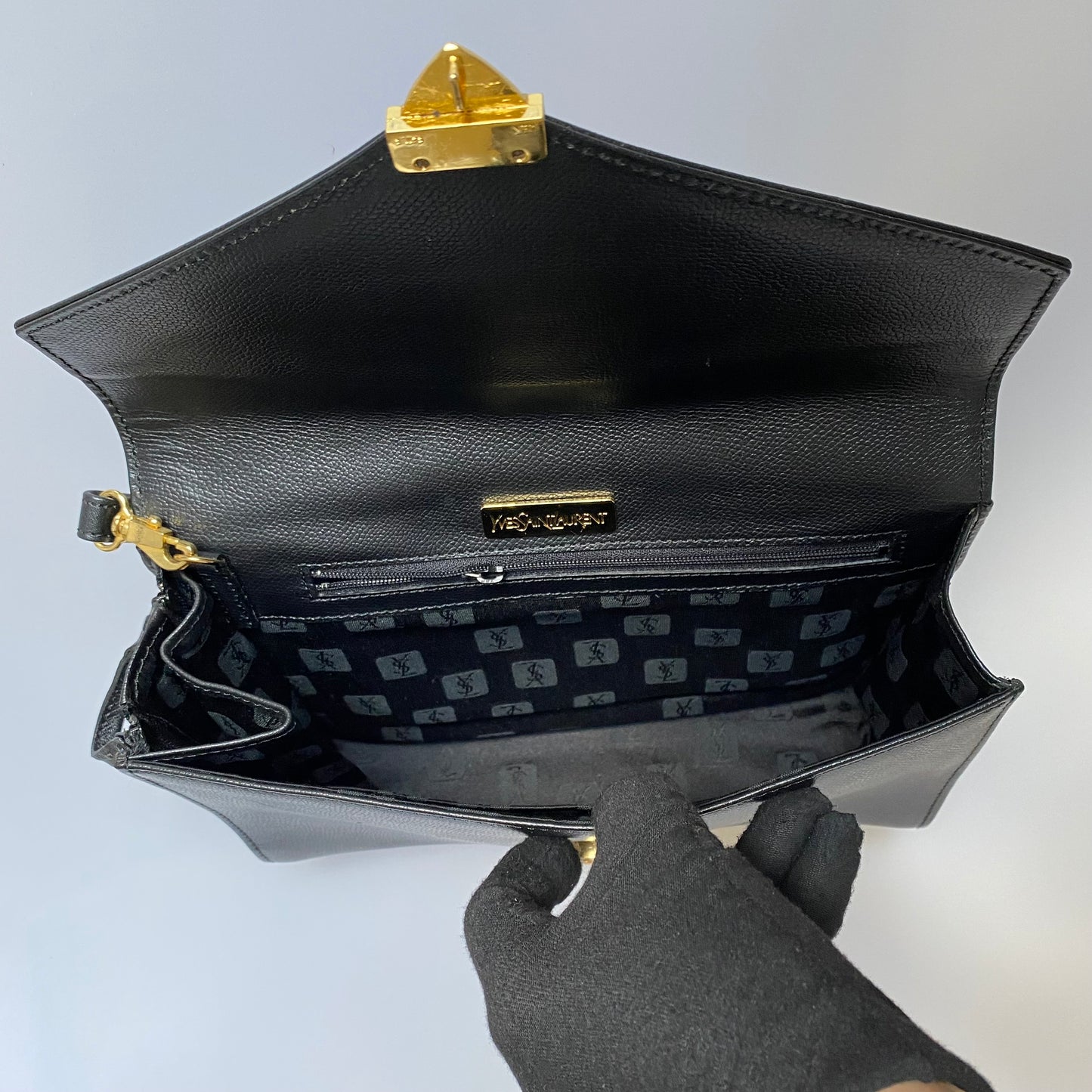 Yves Saint Laurent black leather unisex wristlet clutch bag Authentic with COA