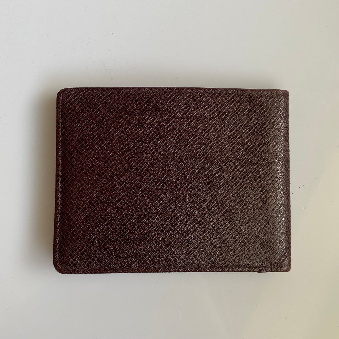 Louis Vuitton brown leather taiga men bifold mi1917 wallet authentic with coa
