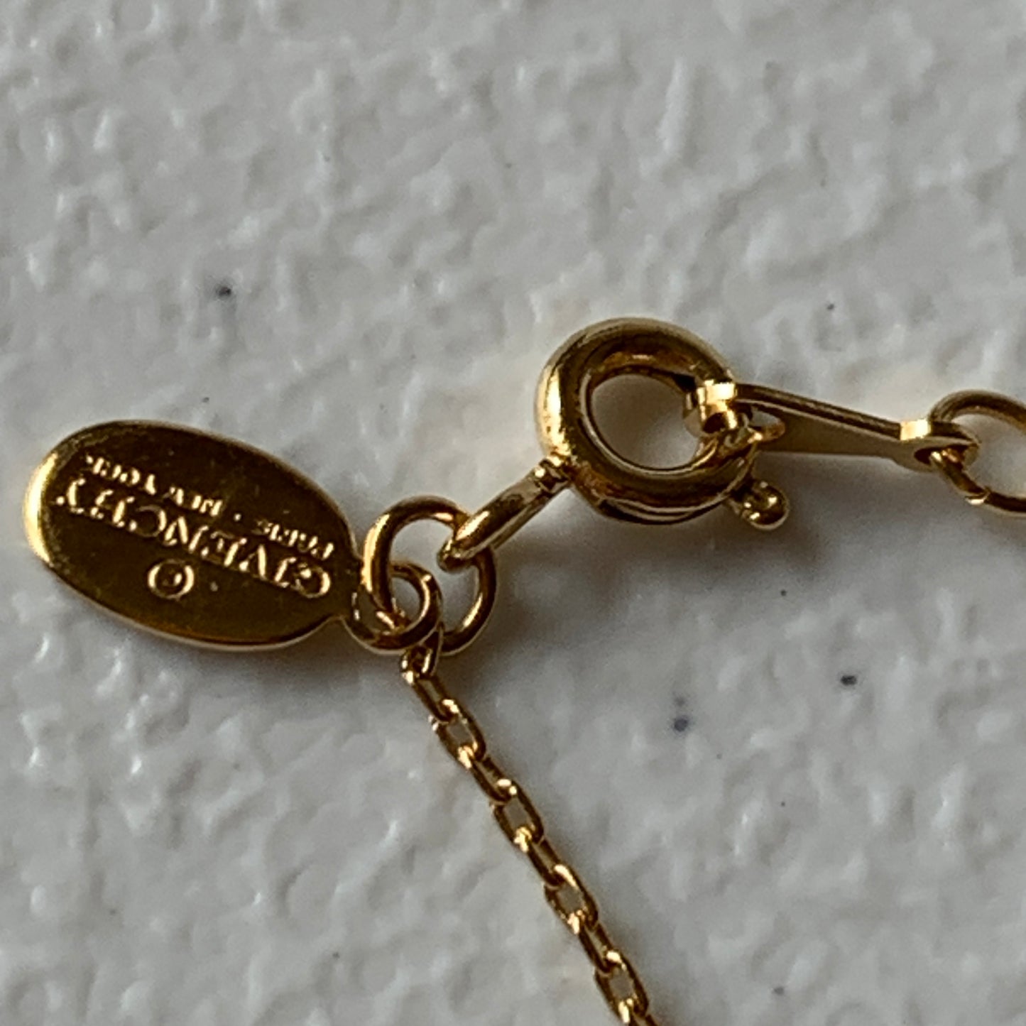 Givenchy gold plated logo pendant necklace Authentic with COA