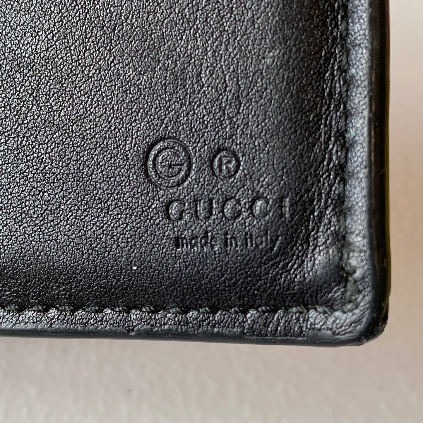 Gucci men’s bifold micro GG black leather wallet Authentic with COA