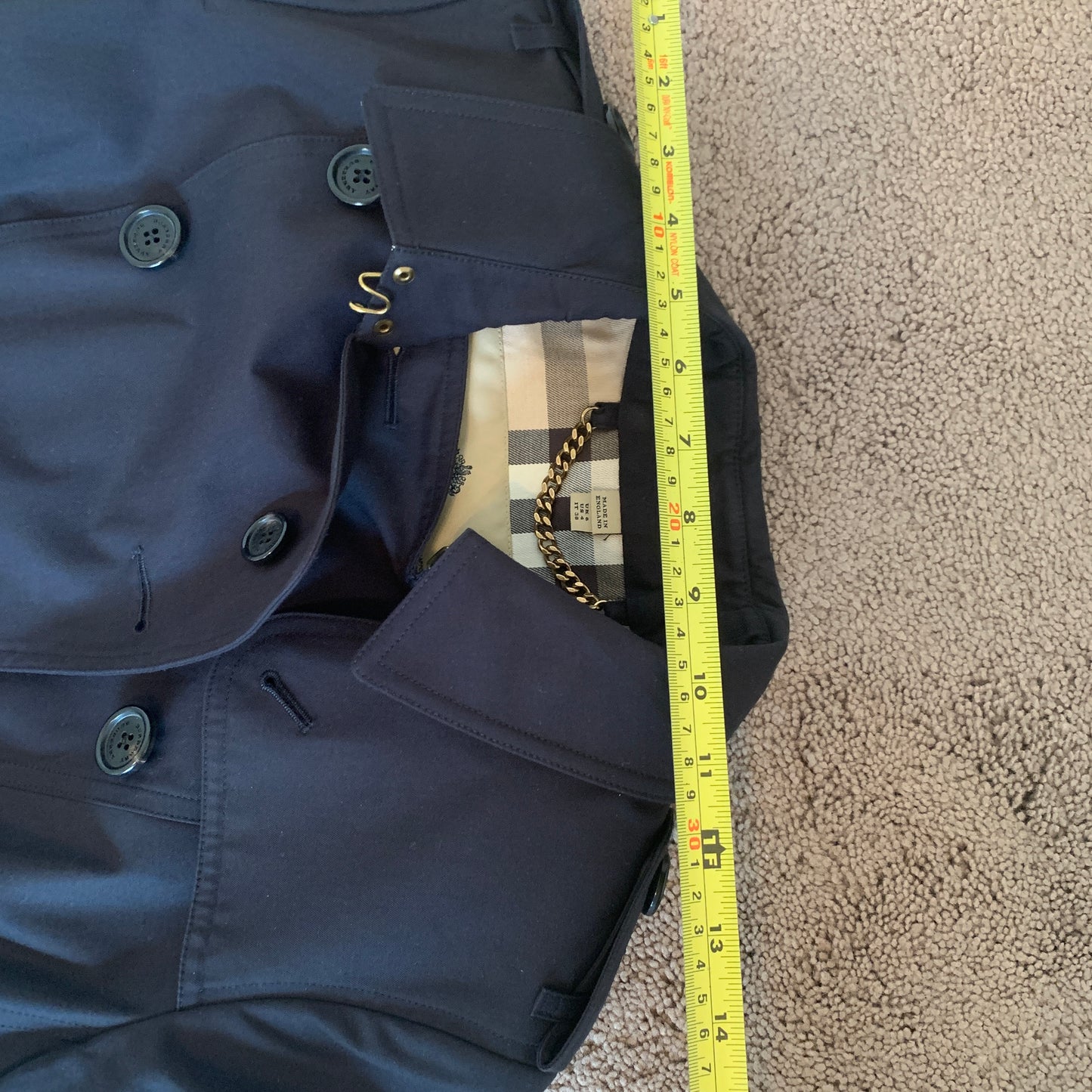 Authentic Burberry women’s trench coat never worn