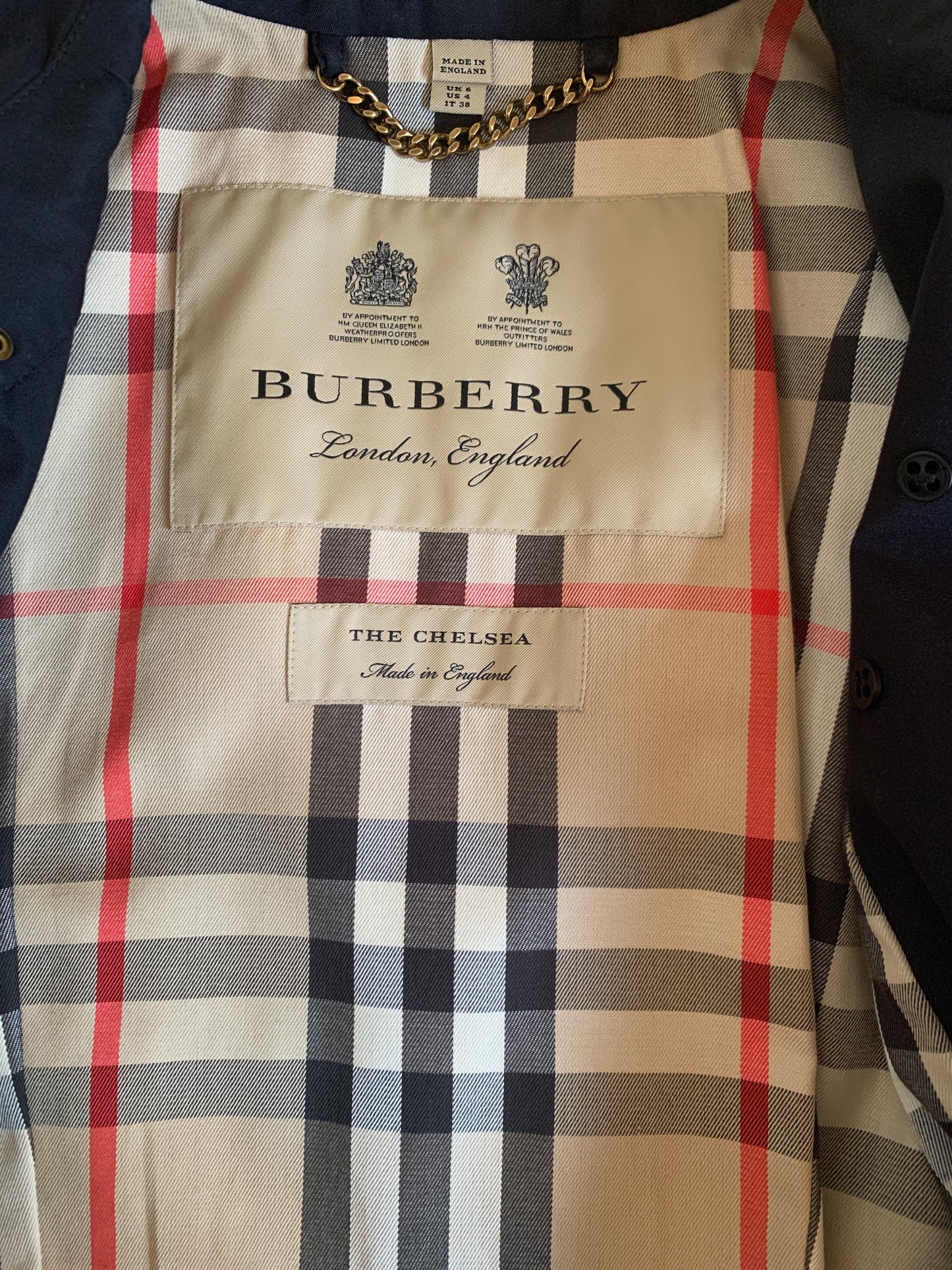 Authentic Burberry women’s trench coat never worn