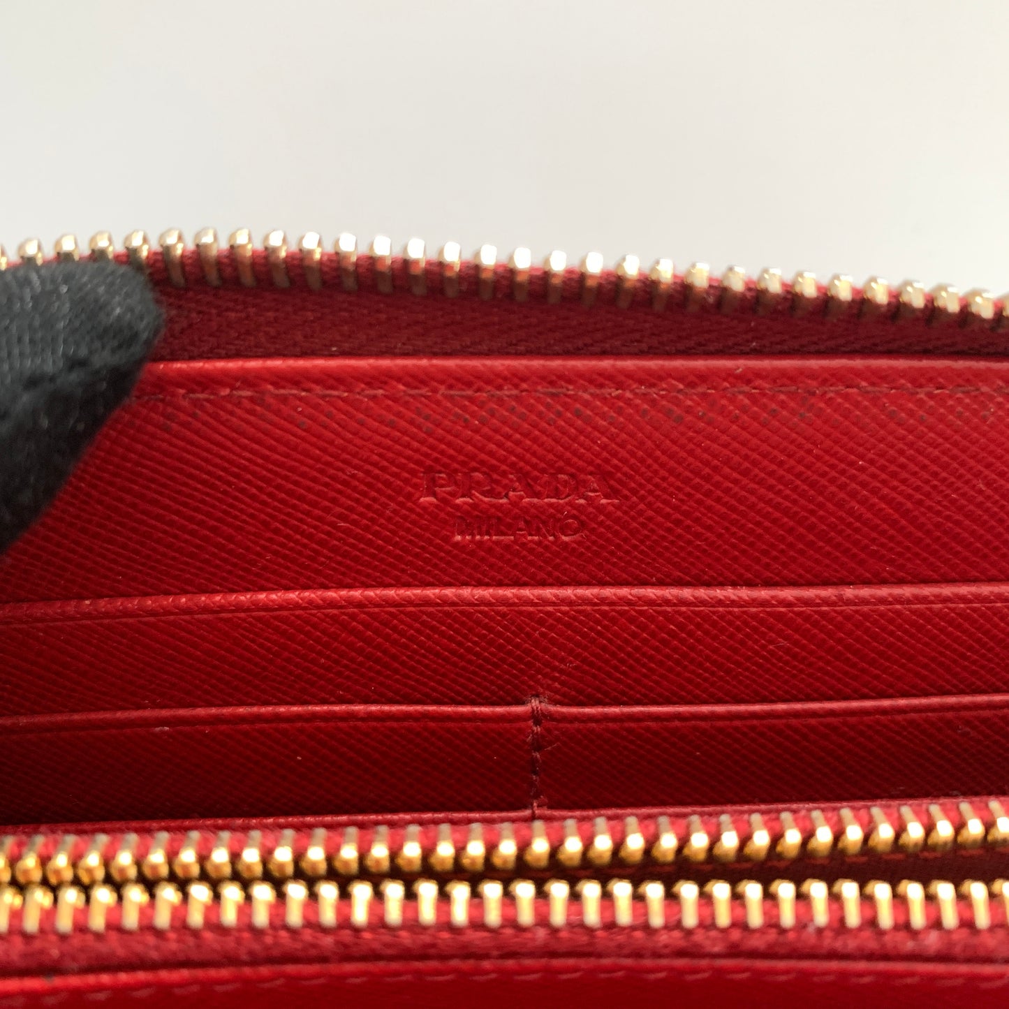Prada women’s red leather long zip around wallet Authentic with COA