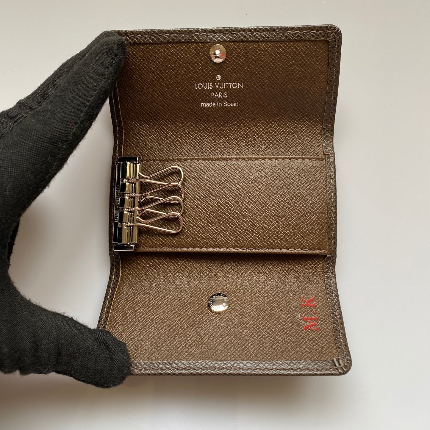 Louis Vuitton taiga brown leather 4 ring key holder CA0098 Authentic with COA box dusty 4.1x2.2