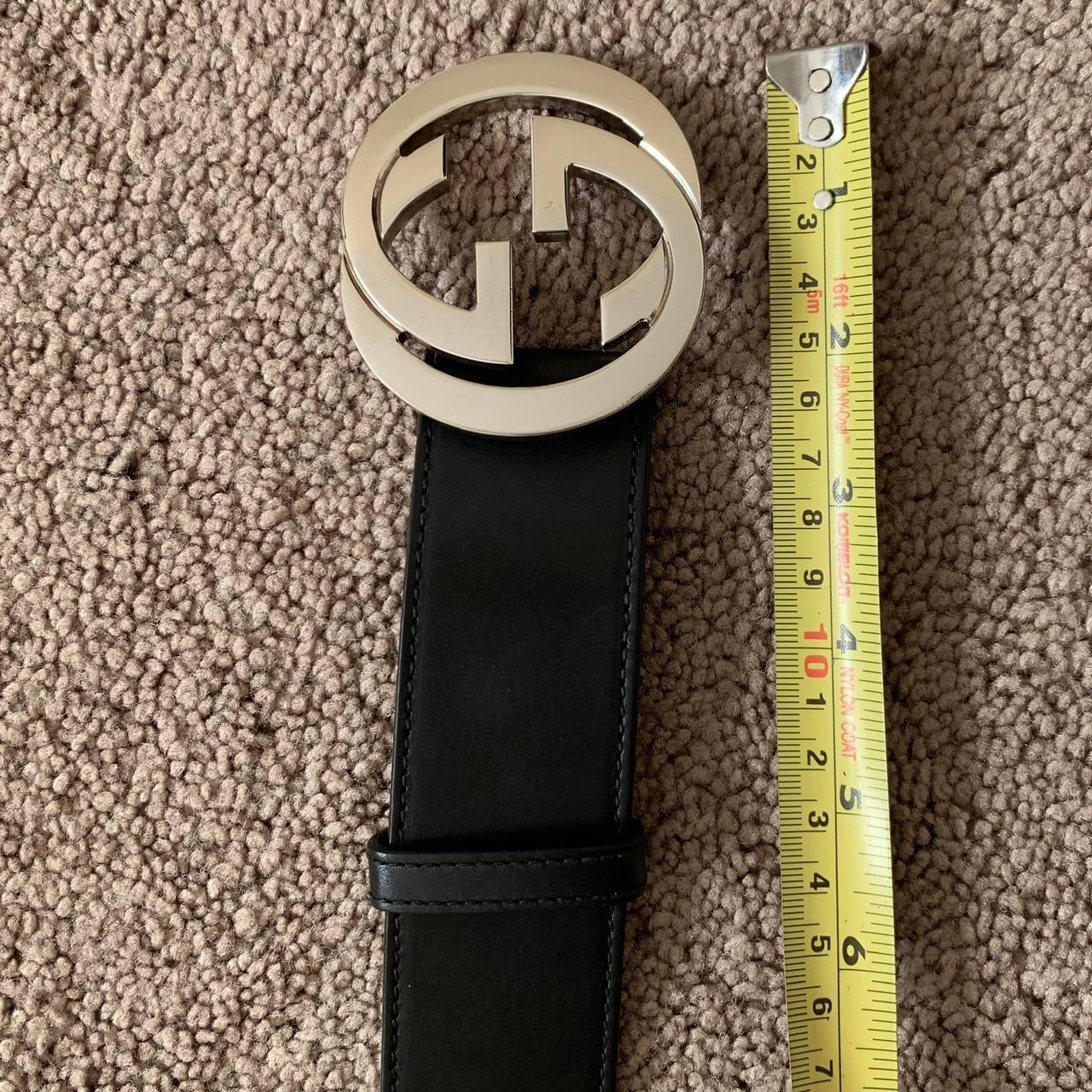 Authentic unisex Gucci black leather belt with silver color interlocking buckle