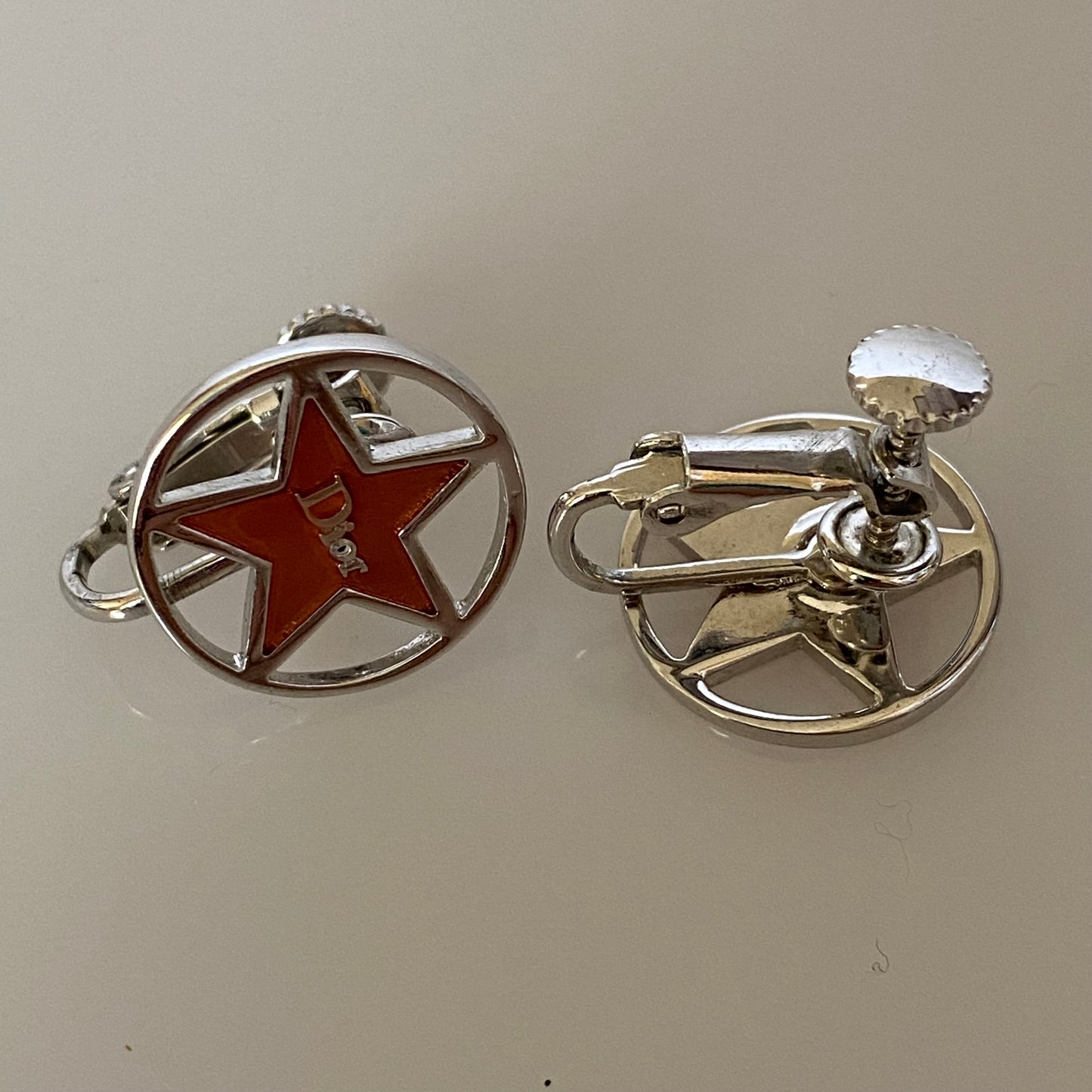 Dior logo star clip on Earring Authentic with coa 1.6cm or 0.63 inch diameter