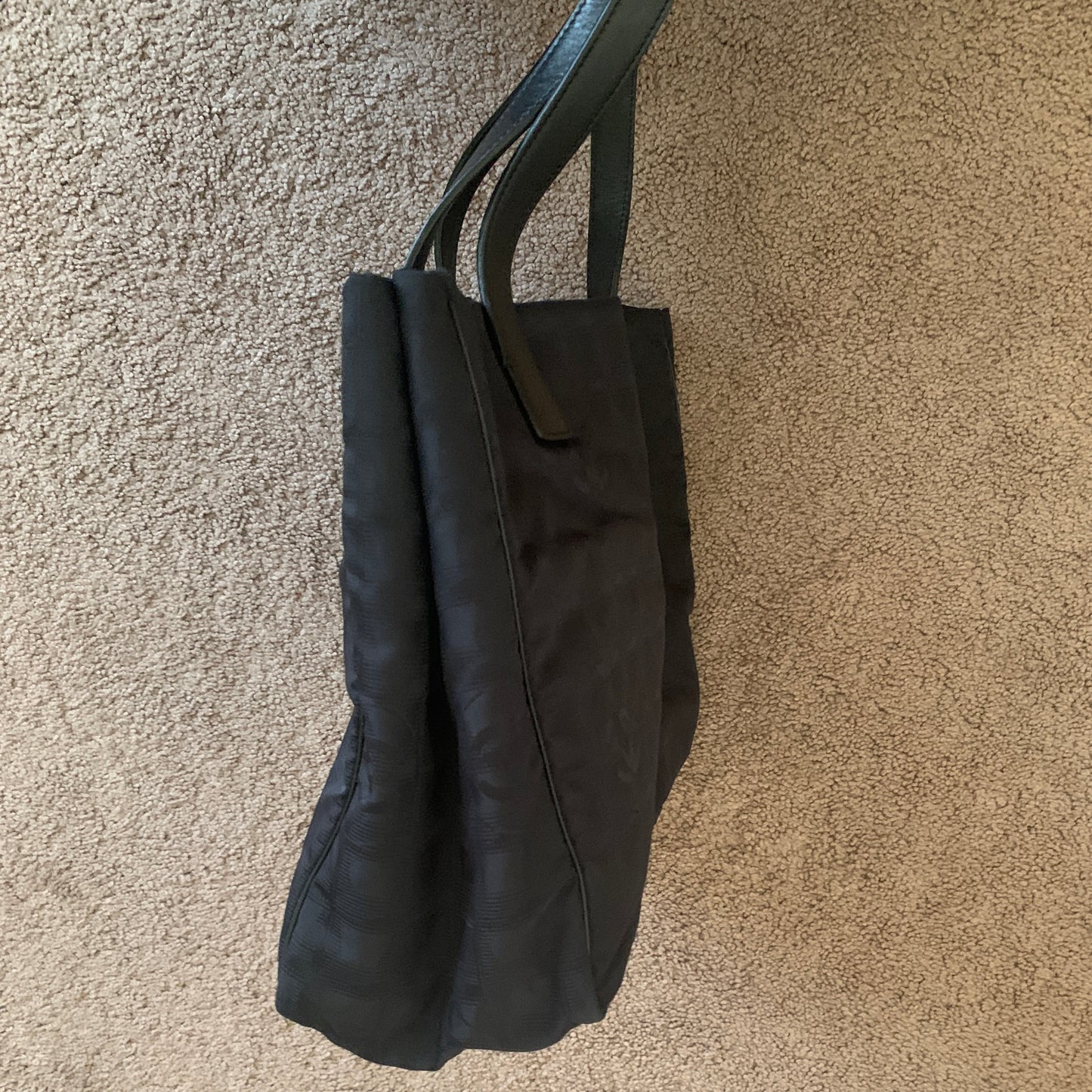 Authentic Chanel women’s New Travel Line black logo tote bag