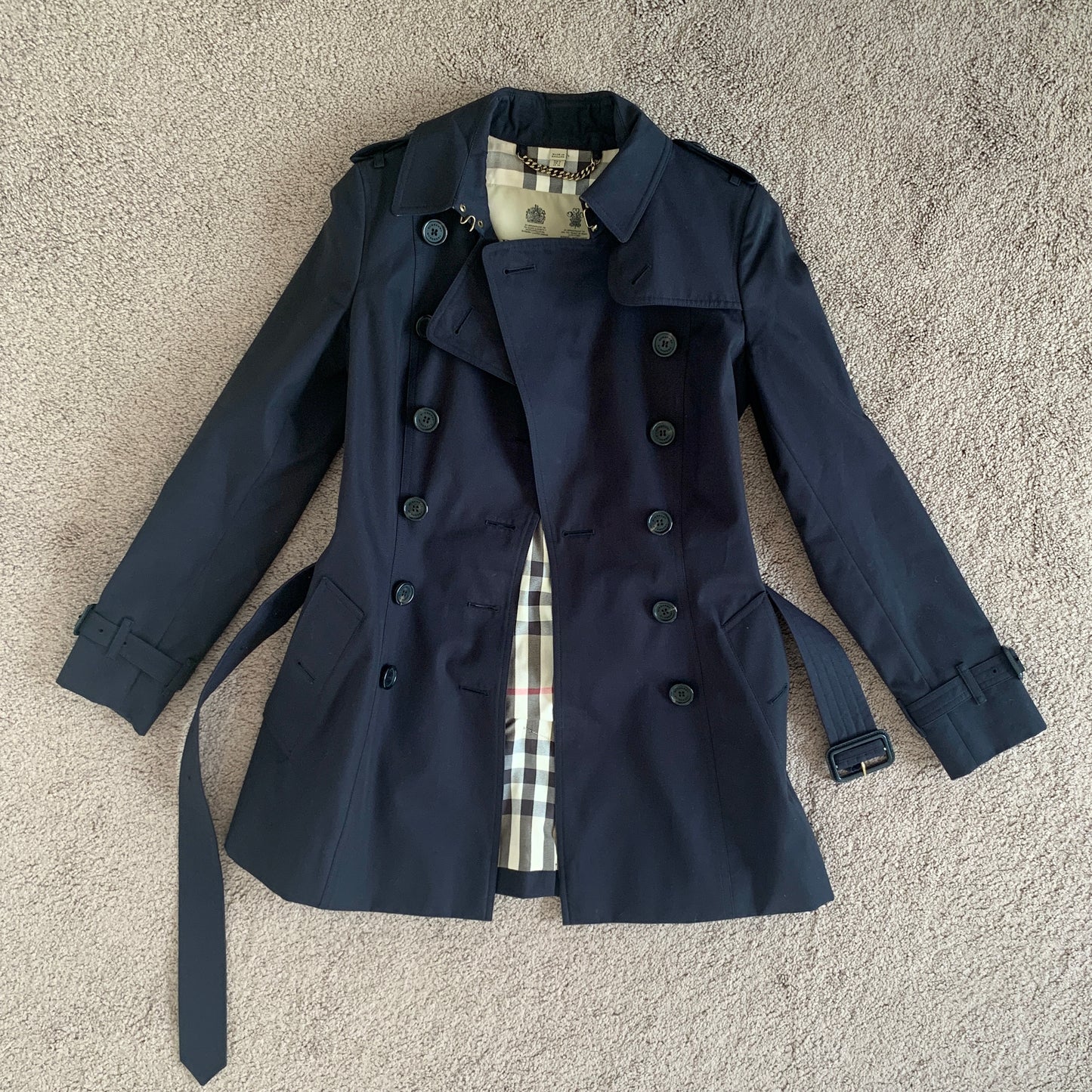 Authentic Burberry women’s trench coat never worn