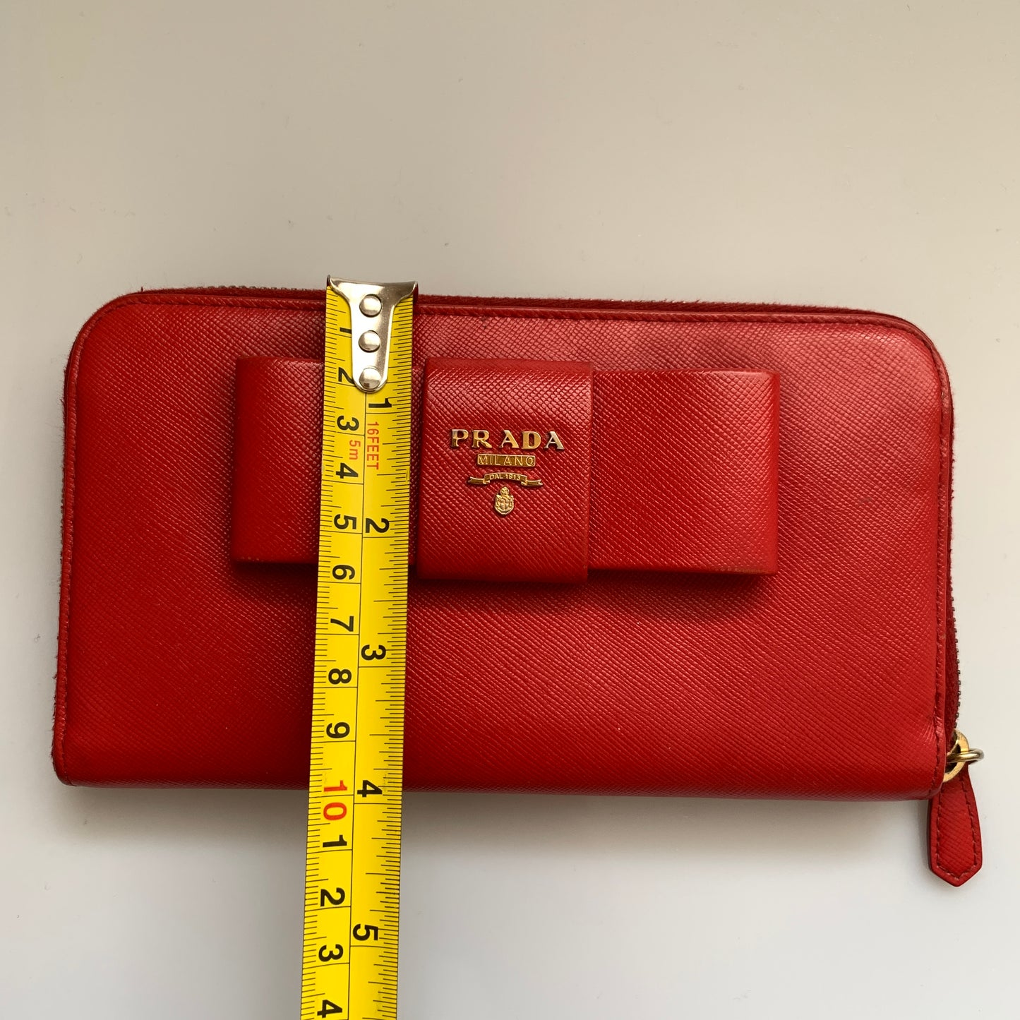 Prada women’s red leather long zip around wallet Authentic with COA