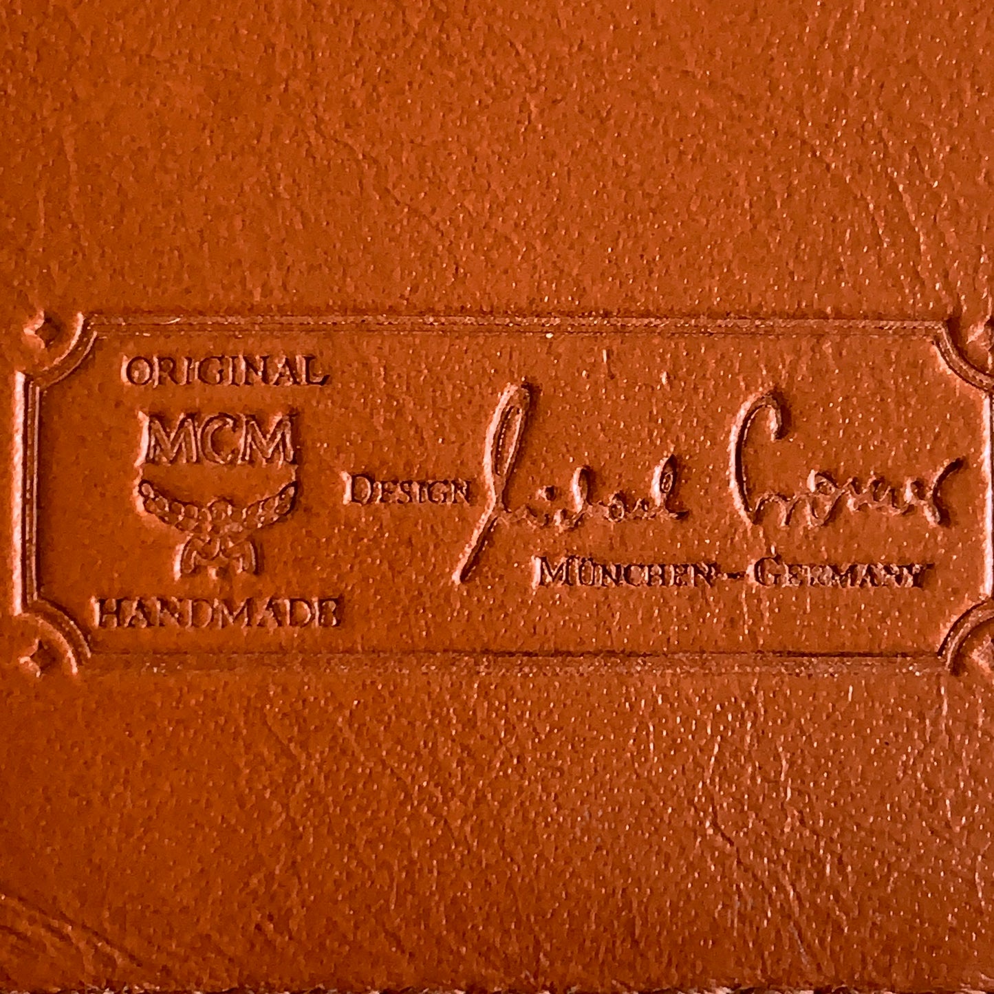 MCM cognac unisex bifold long wallet authentic with COA