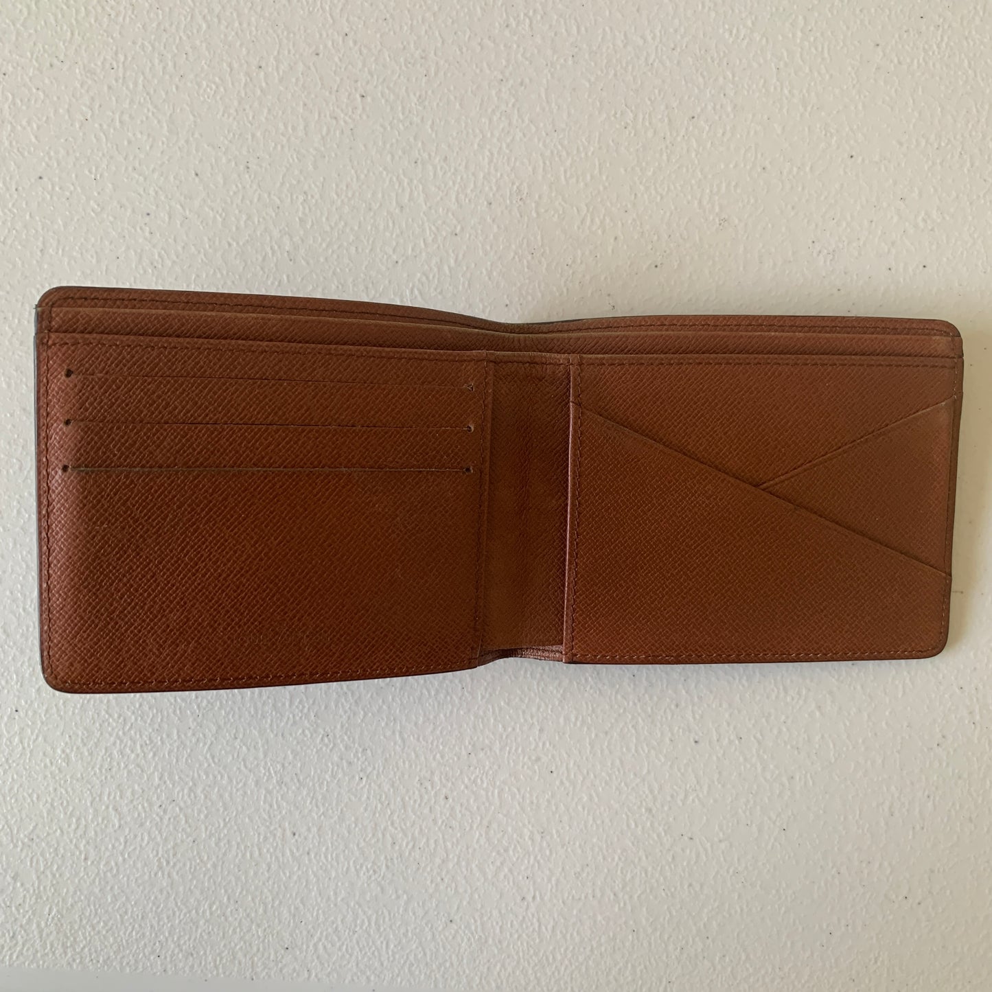 Louis Vuitton men’s bifold monogram wallet RA1920 authentic with COA