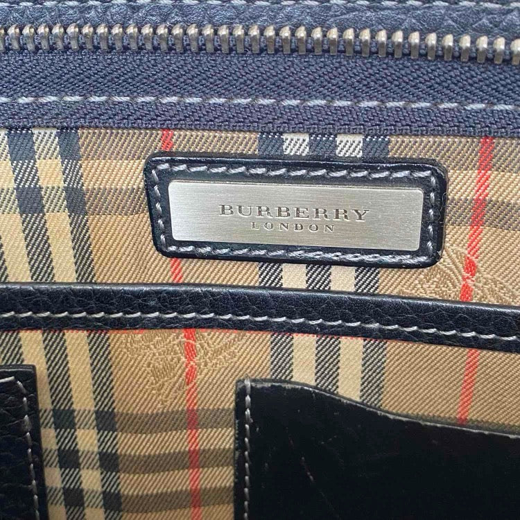 Burberry black leather clutch bag authentic with COA 8.6x5.6x2.3