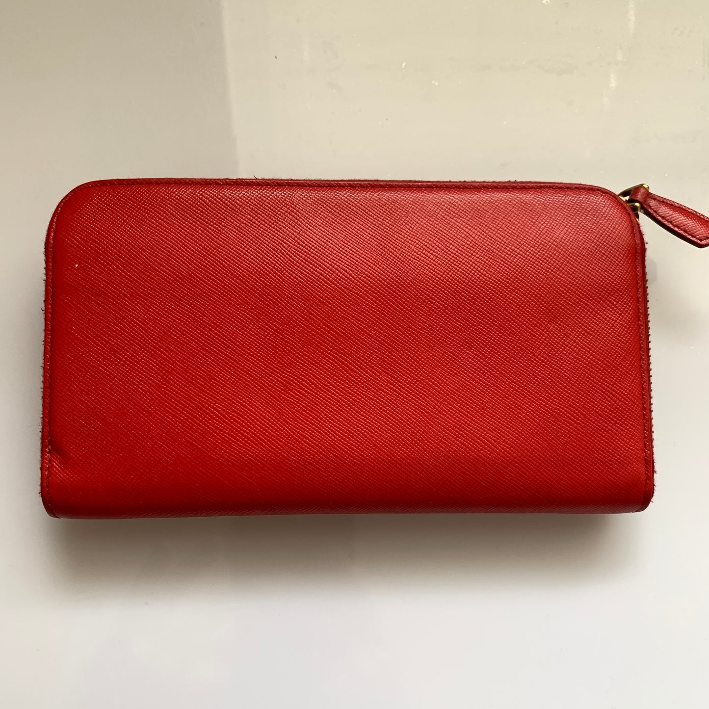 Prada women’s red leather long zip around wallet Authentic with COA