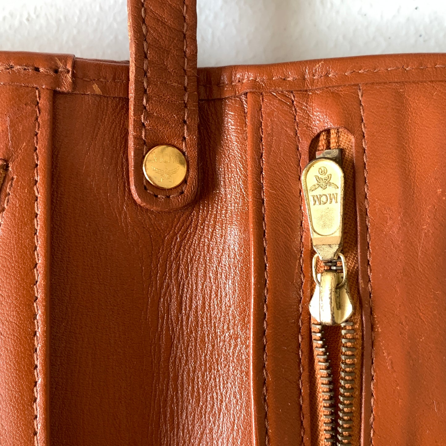MCM cognac visetos unisex clutch bag with flap Authentic with COA