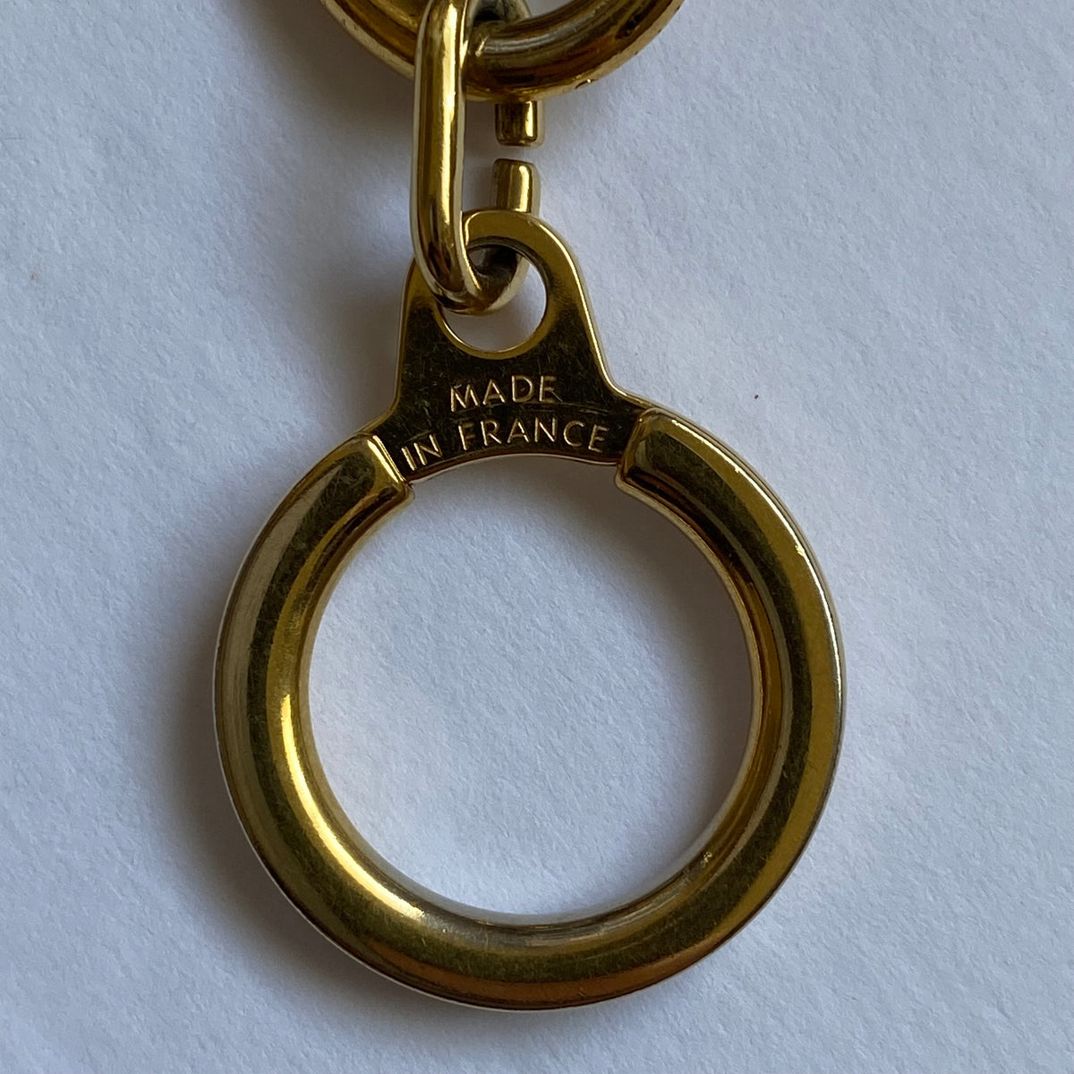 Louis Vuitton gold tone key ring  holder Authentic with COA 3 inch