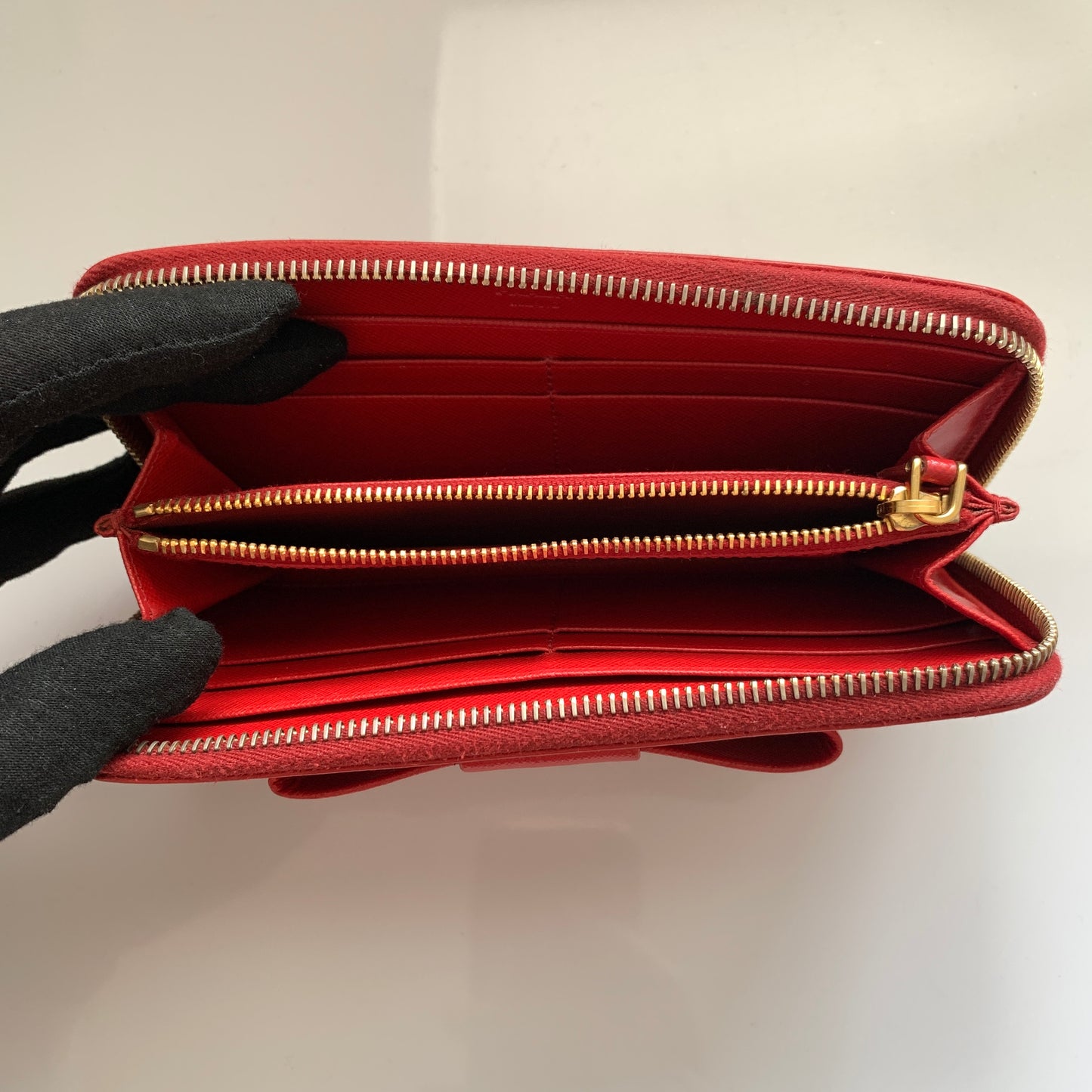 Prada women’s red leather long zip around wallet Authentic with COA