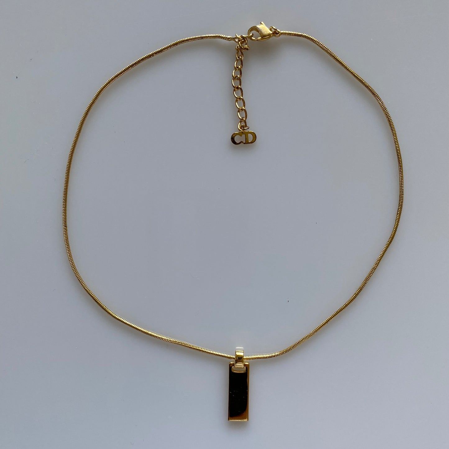 Dior logo plate pendant gold plated adjustable necklace Authentic with COA