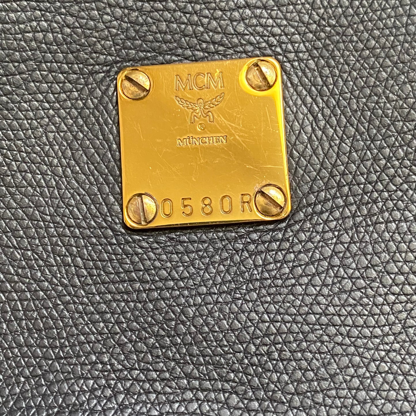 MCM black leather crossbody bucket bag Authentic with COA