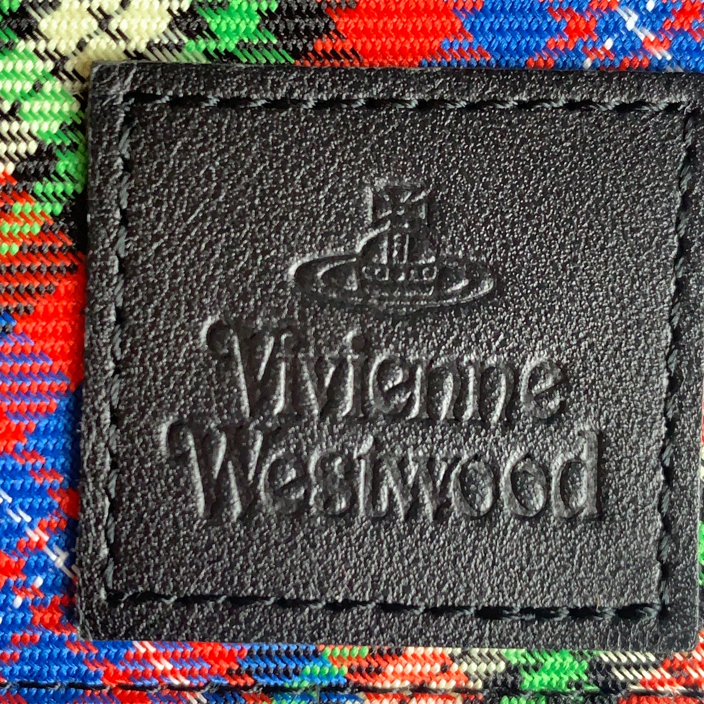 Vivienne Westwood zippy check pouch authentic with COA