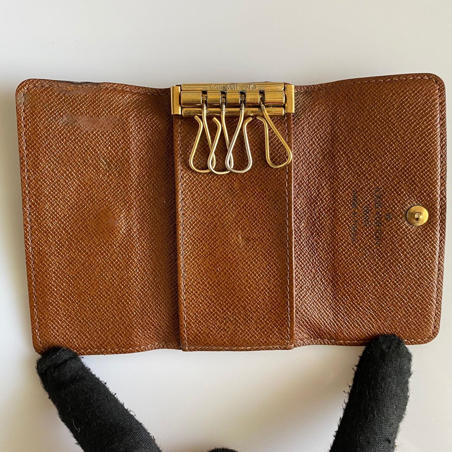 Louis Vuitton monogram 4 ring key holder Authentic with coa