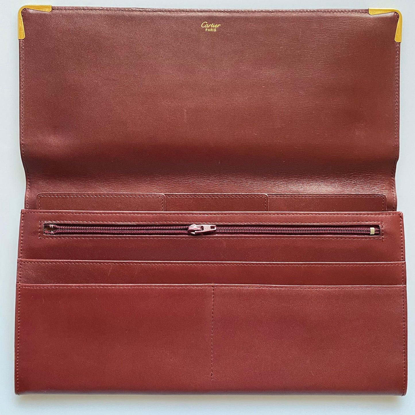 Cartier burgundy leather clutch bag purse Authentic with COA