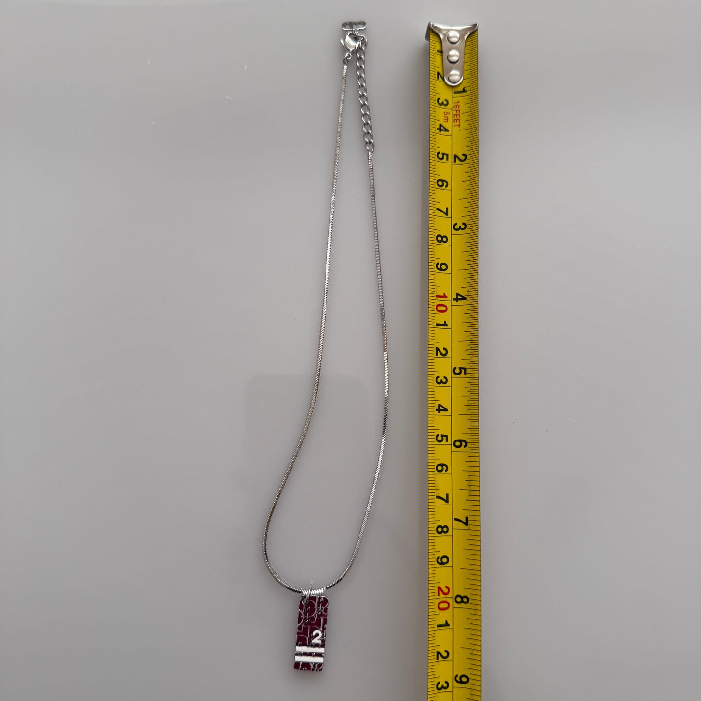 Christian Dior silver chain necklace red trotter pendant authentic with COA 007