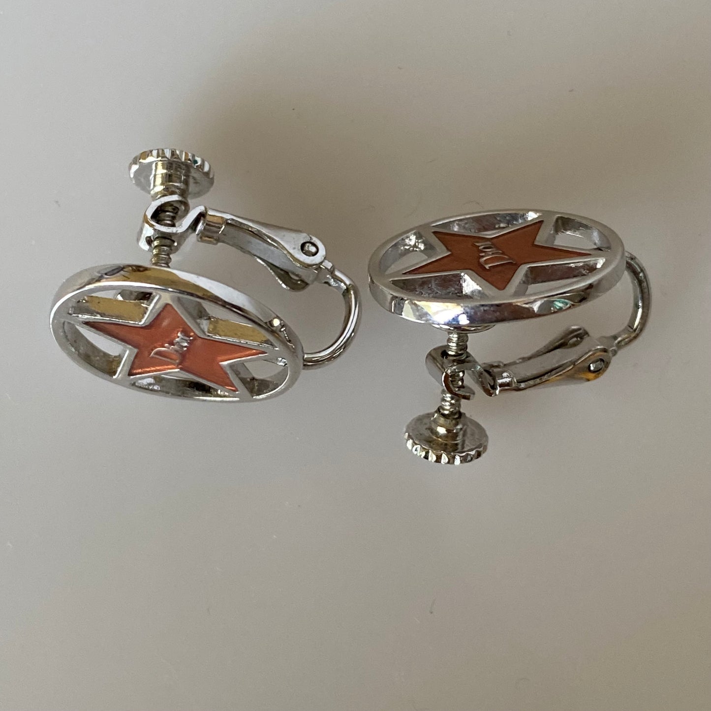 Dior logo star clip on Earring Authentic with coa 1.6cm or 0.63 inch diameter
