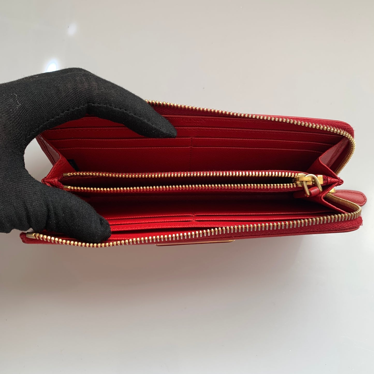 Prada women’s red long zip around wallet Authentic of COA