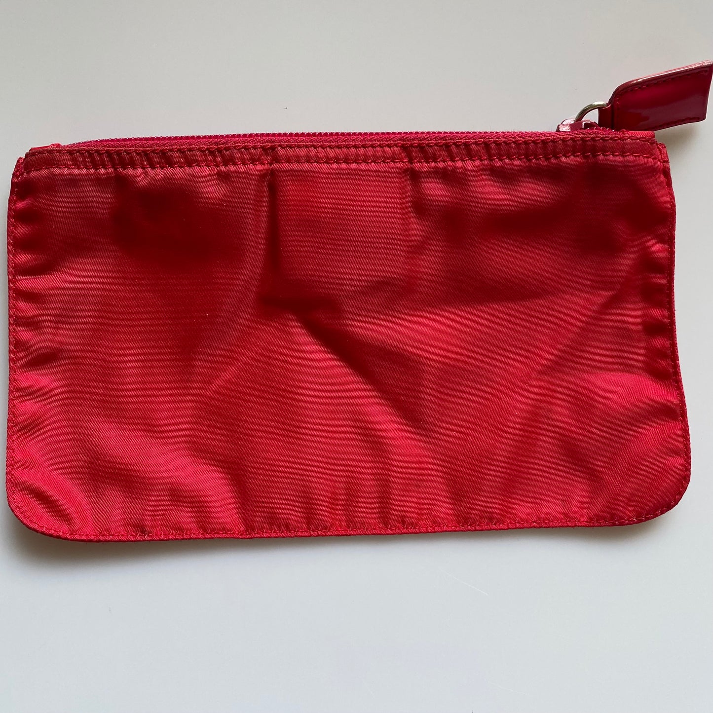 Prada triangle logo red pouch authentic with COA