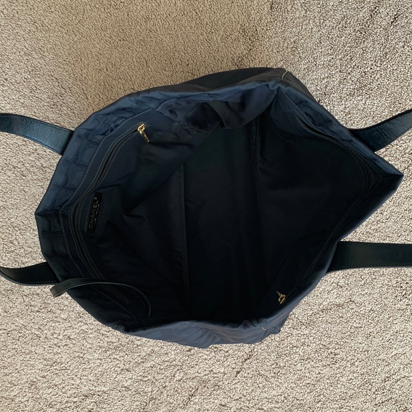 Authentic Chanel women’s New Travel Line black logo tote bag