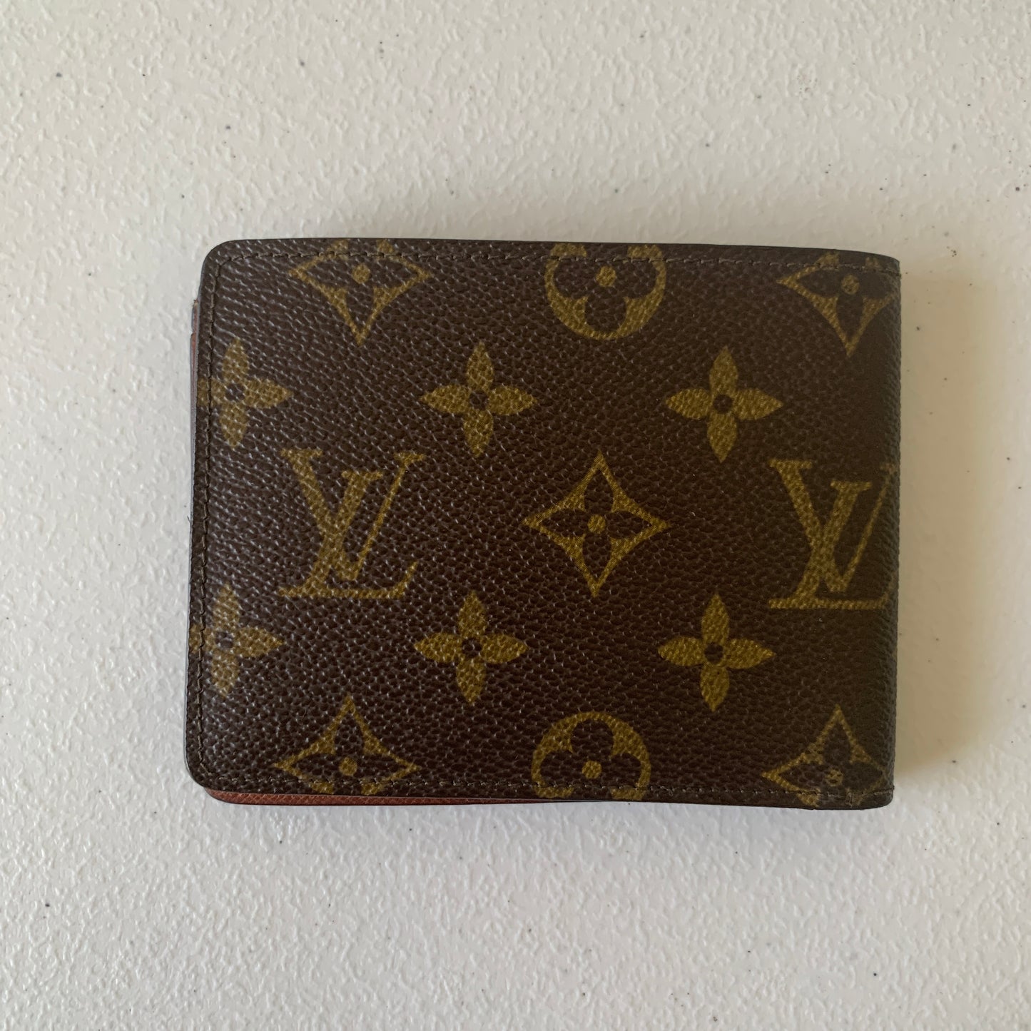 Louis Vuitton men’s bifold monogram wallet RA1920 authentic with COA