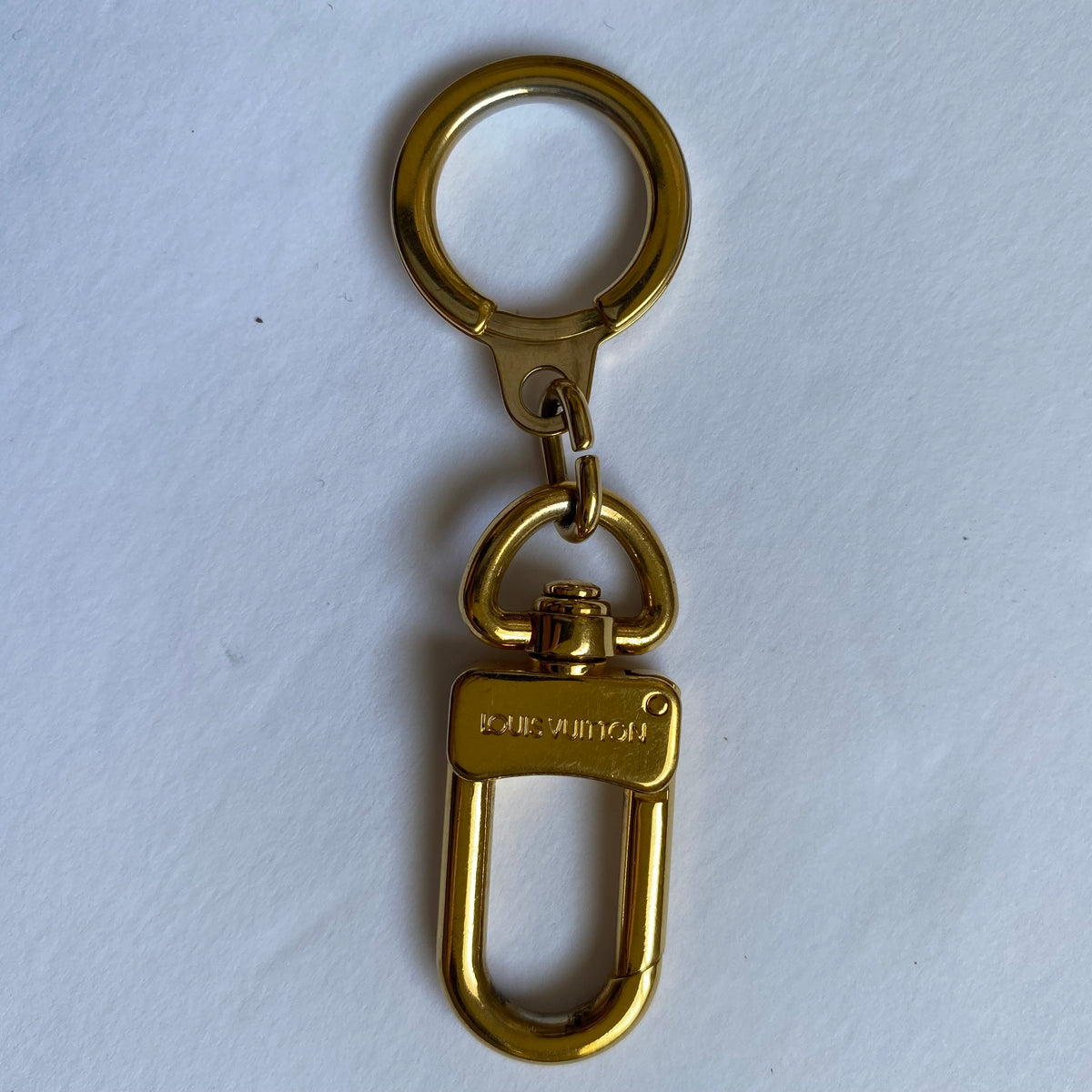Louis Vuitton gold tone key ring  holder Authentic with COA 3 inch