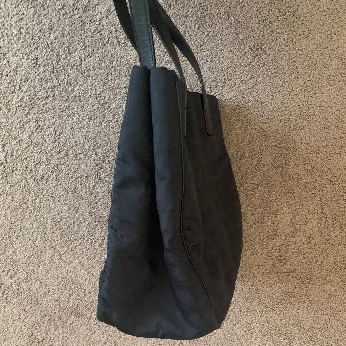 Authentic Chanel women’s New Travel Line black logo tote bag