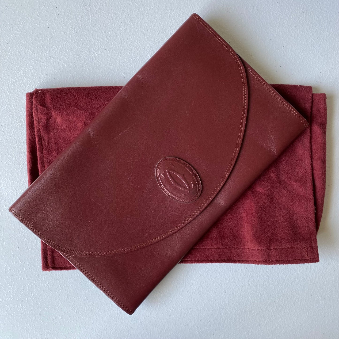 Cartier burgundy leather clutch bag authentic with coa dusty