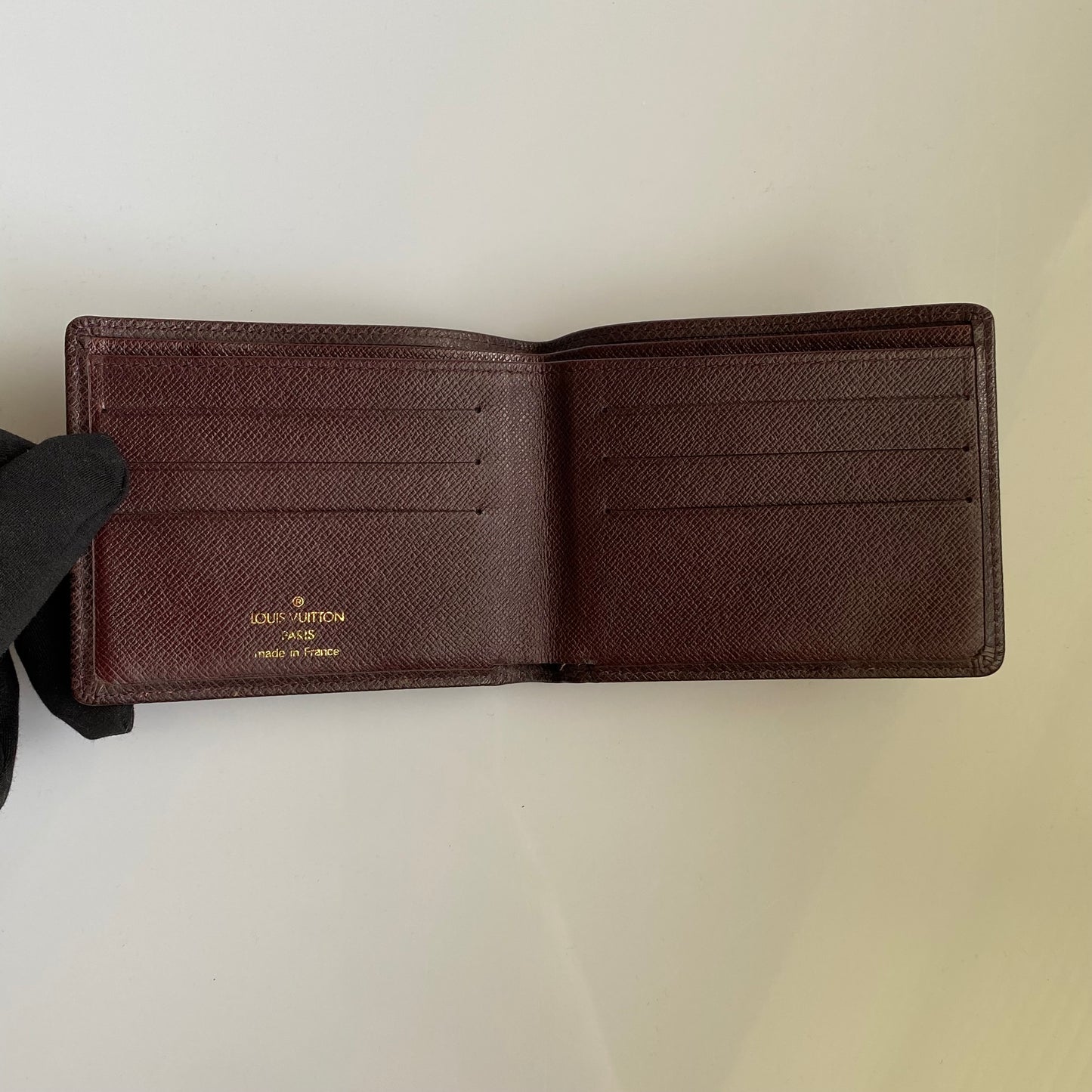 Louis Vuitton brown leather taiga men bifold mi1917 wallet authentic with coa