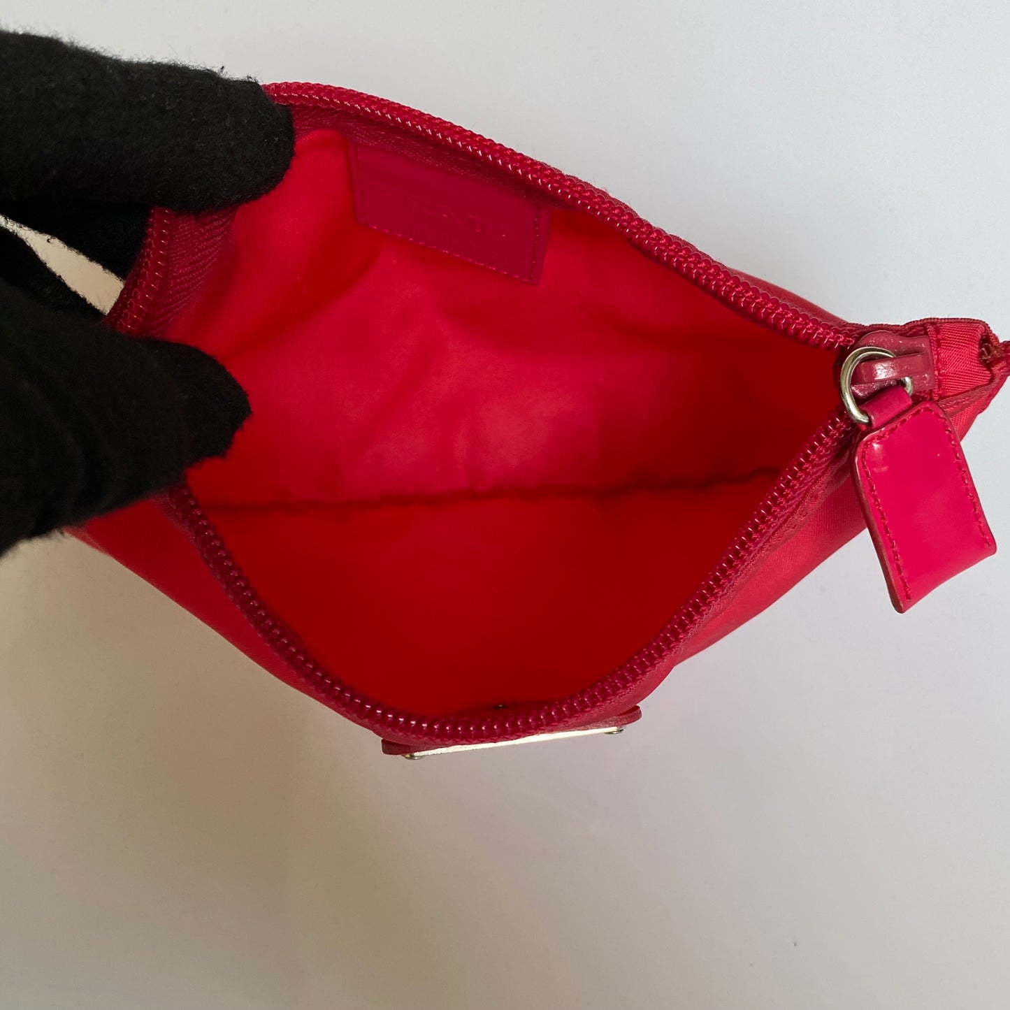 Prada triangle logo red pouch authentic with COA