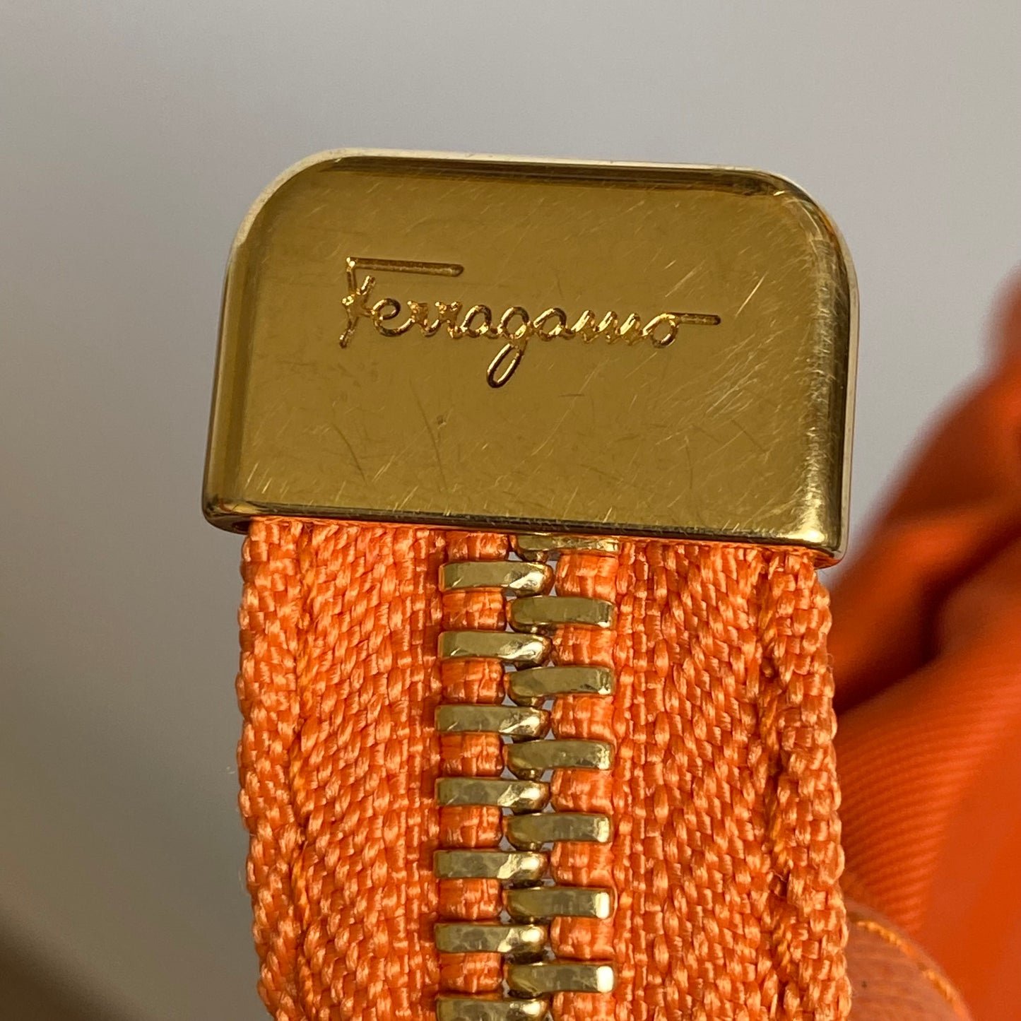 Ferragamo Orange vara bow pouch Authentic with COA