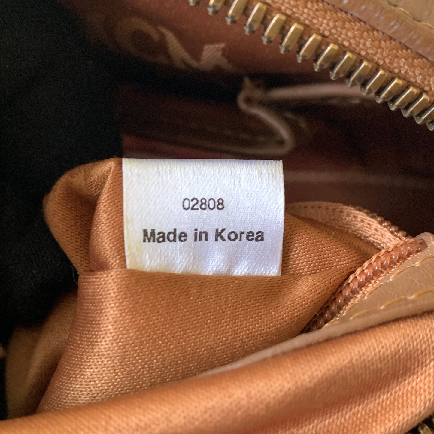 MCM cognac visetos Boston bag Authentic with COA