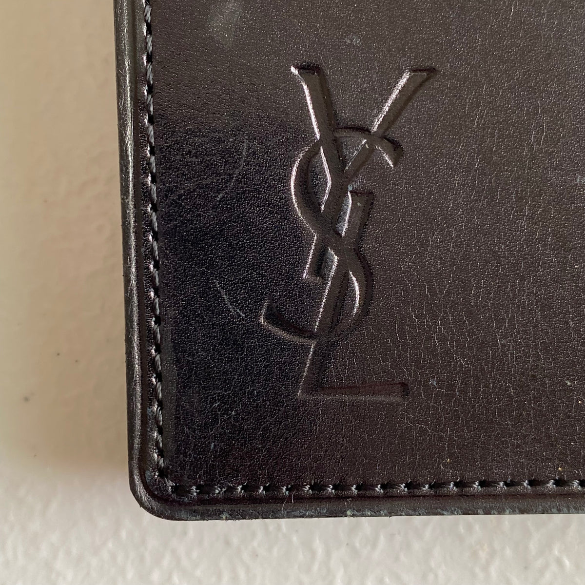 Yves Saint Laurent men’s bifold black leather wallet Authentic with COA 4.2x3.9