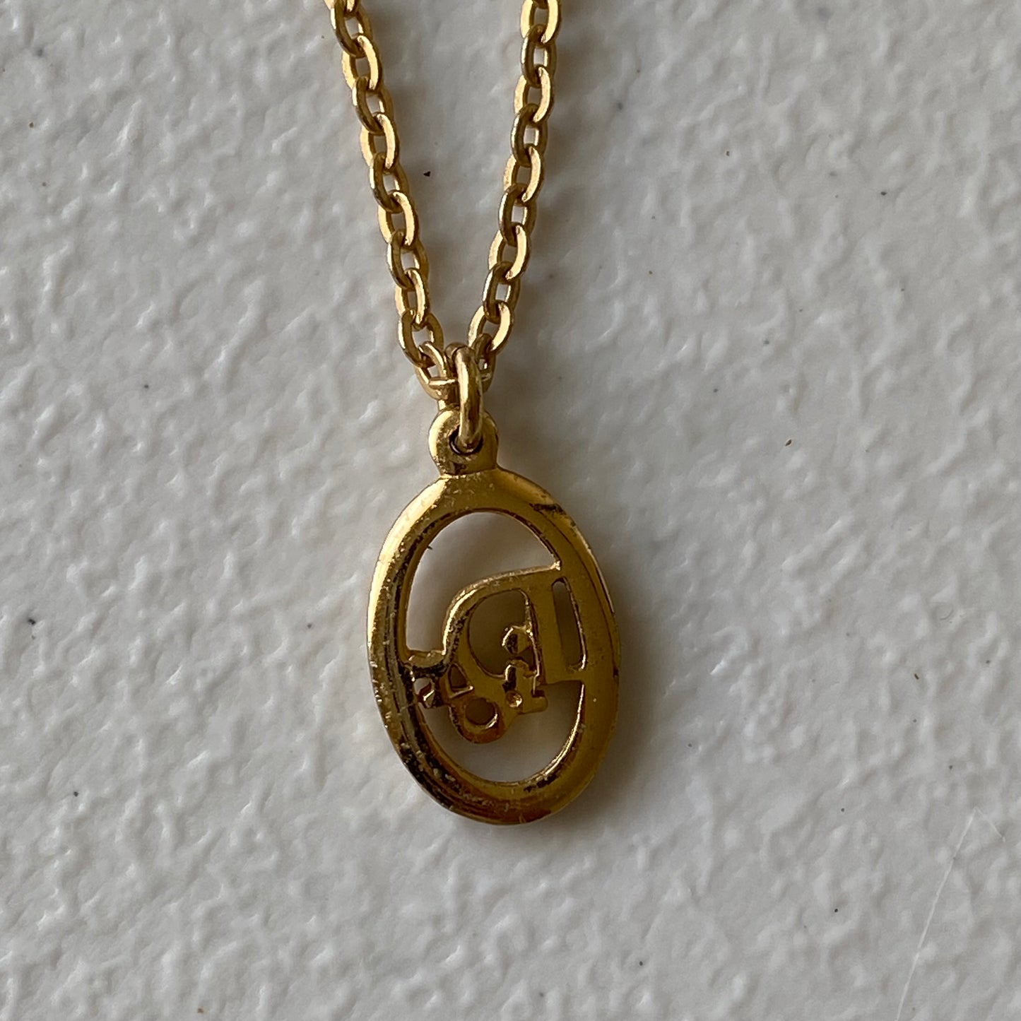 Dior CD logo pendant gold plated adjustable necklace Authentic with coa