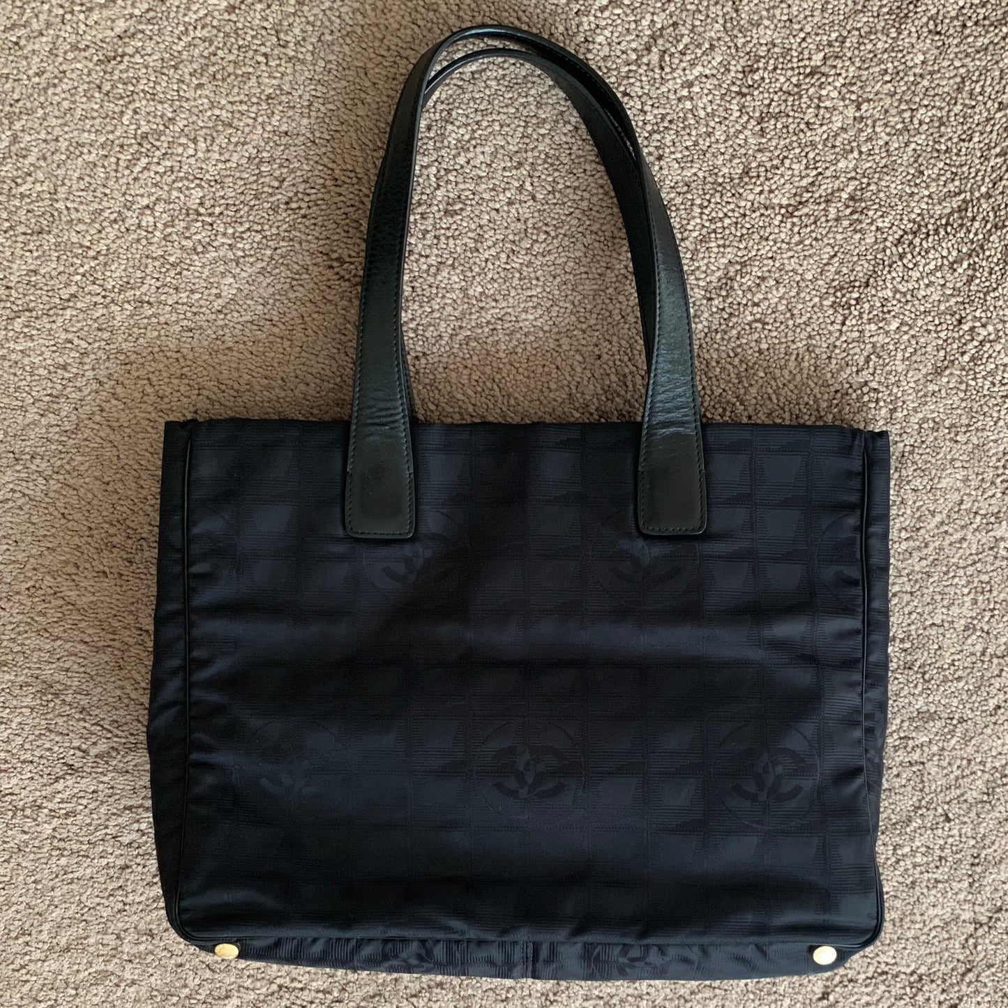 Authentic Chanel women’s New Travel Line black logo tote bag