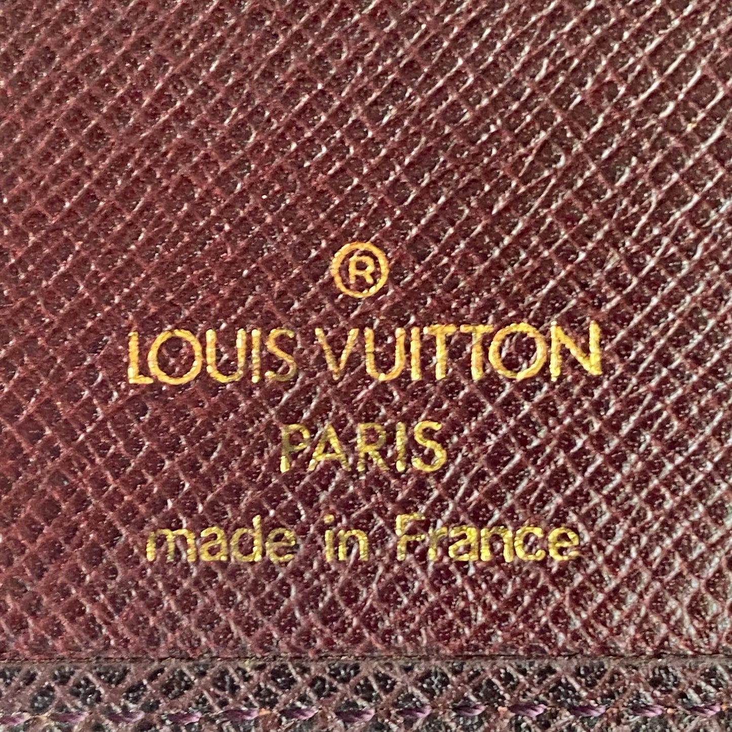 Louis Vuitton brown leather taiga men bifold mi1917 wallet authentic with coa