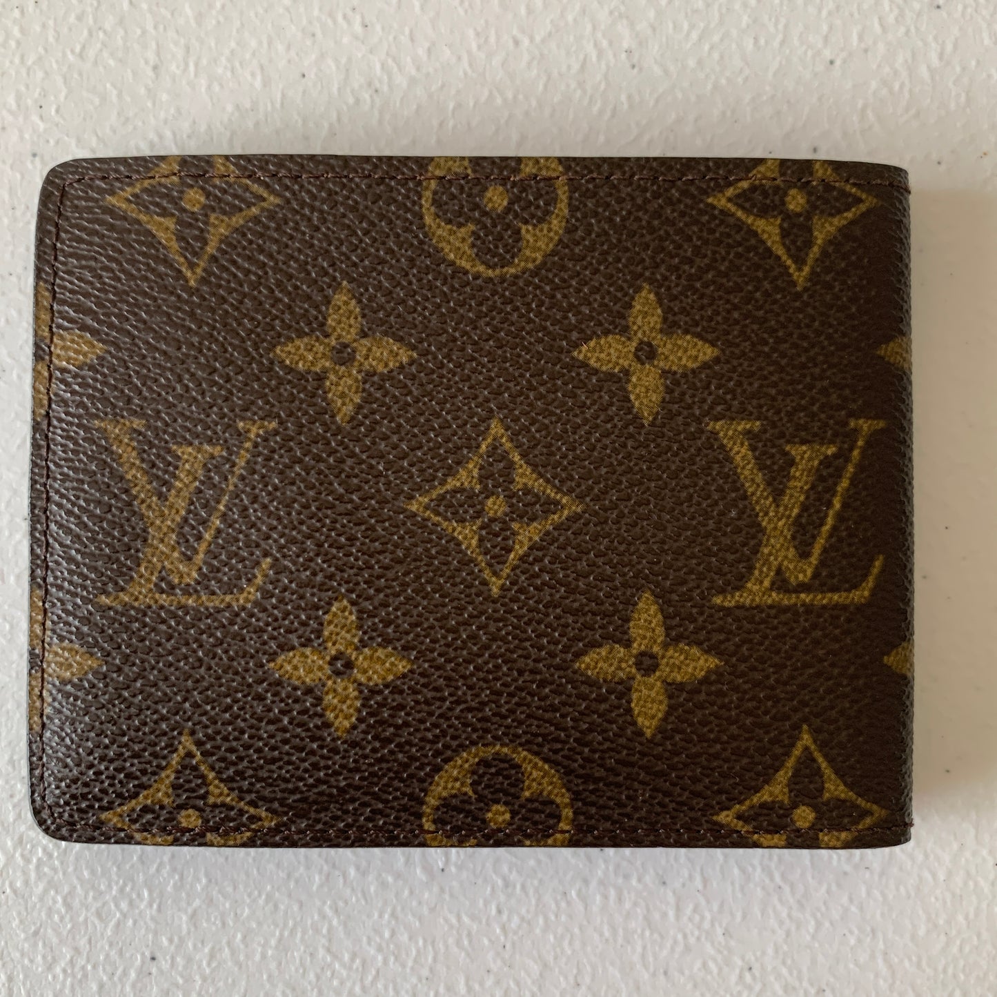 Louis Vuitton monogram men’s bifold Wallet RA2057 authentic with COA