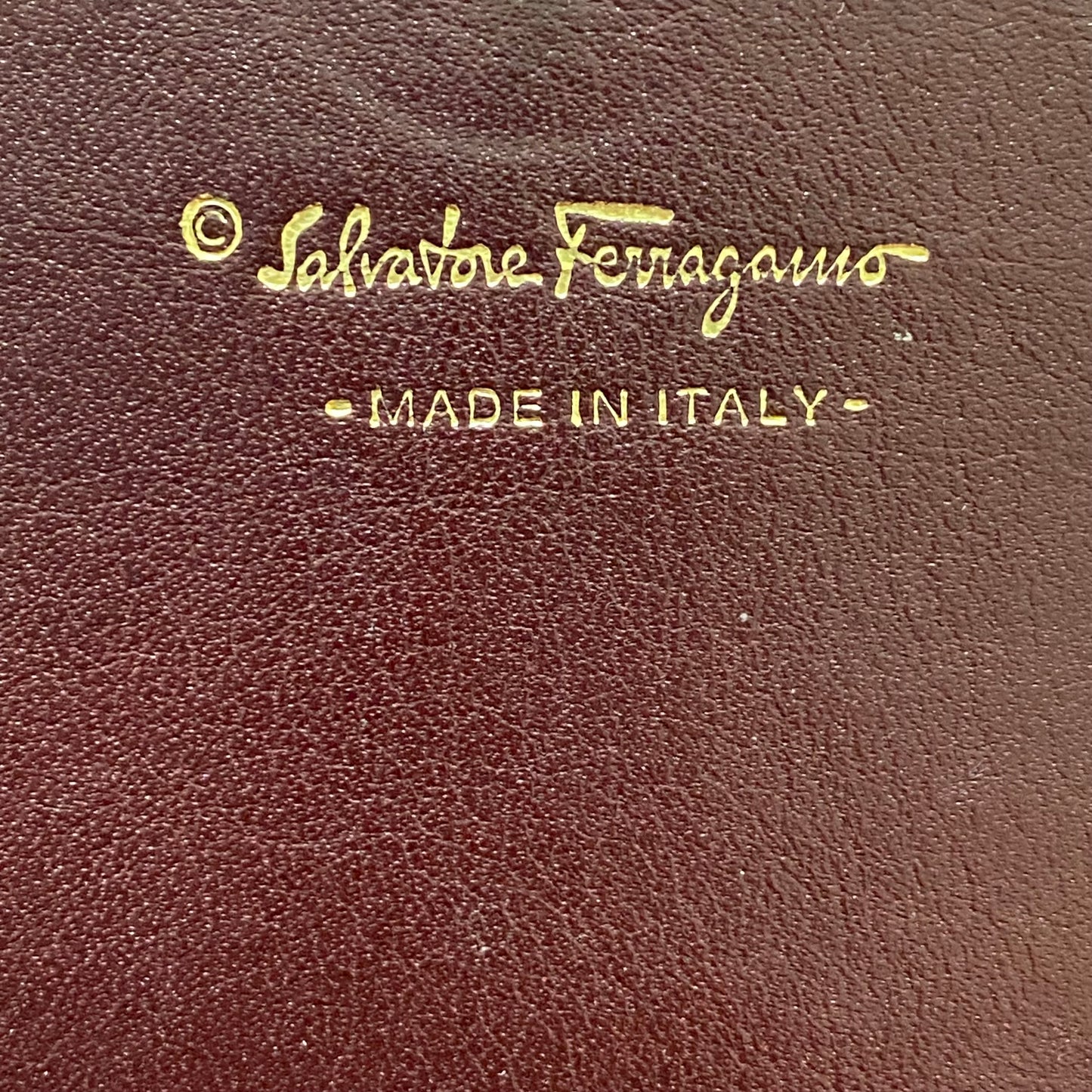 Ferragamo burgundy leather long wallet Authentic with coa