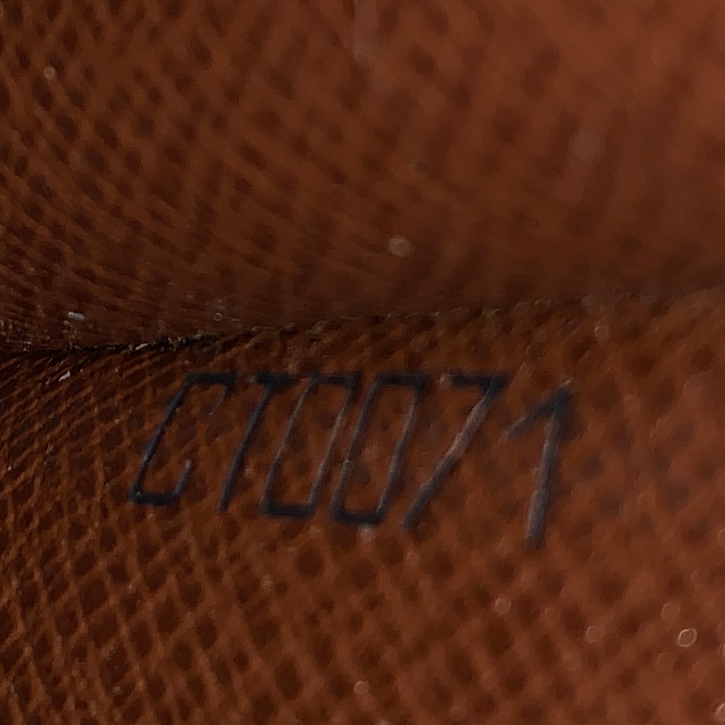 Louis Vuitton monogram case CT0070 authentic with COA